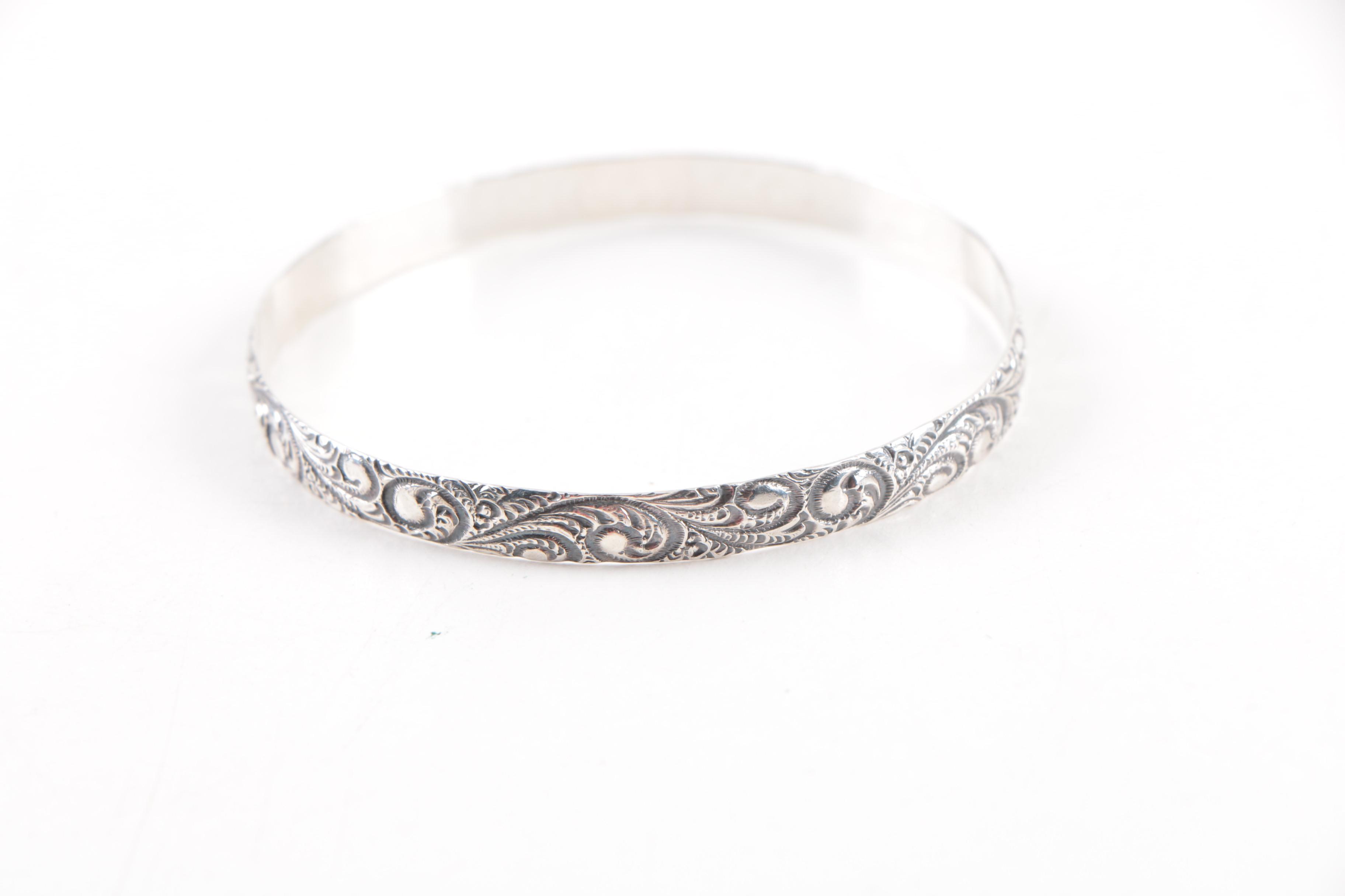 Four Sterling Silver Bracelets