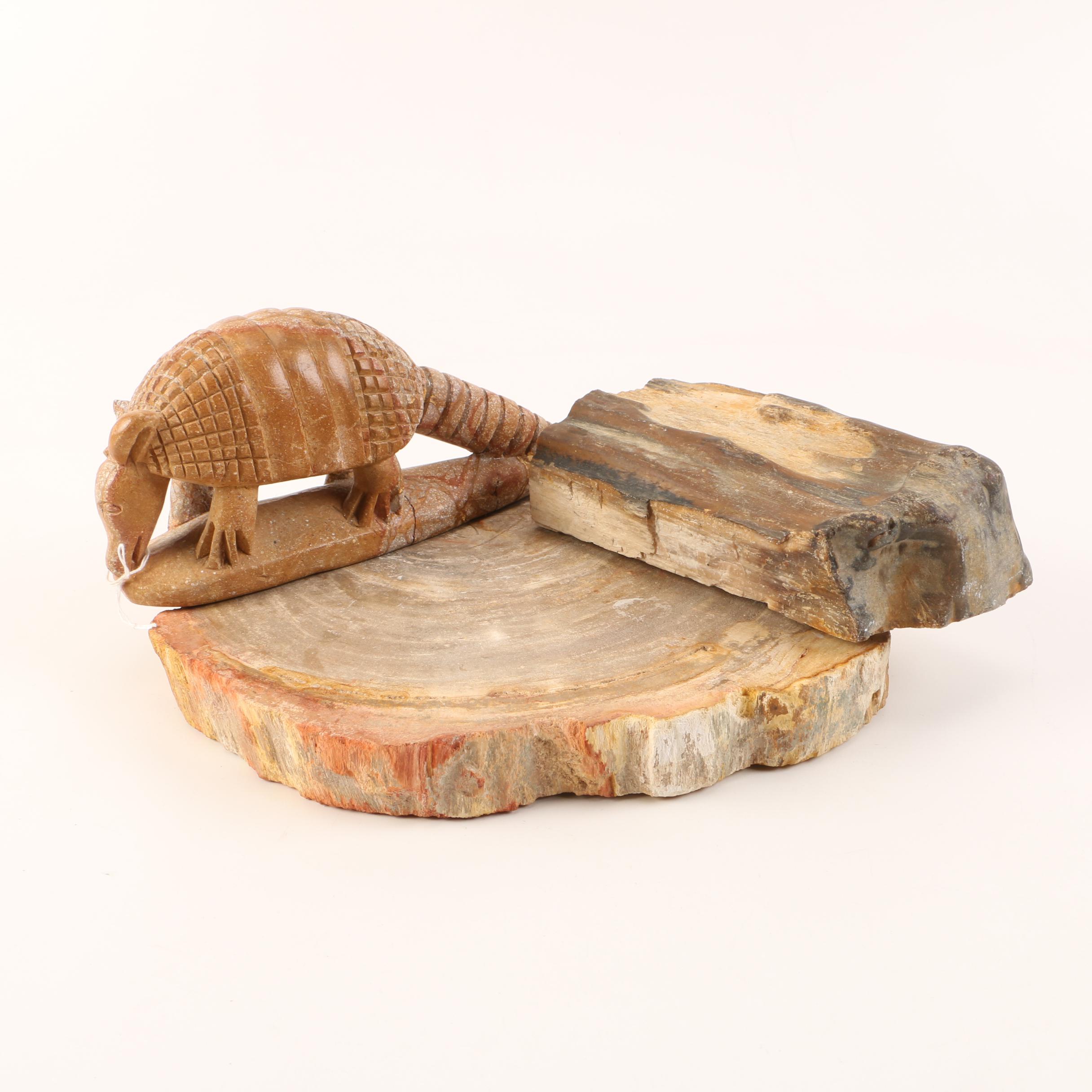 Petrified Wood Specimens and Carved Jasper Figurine