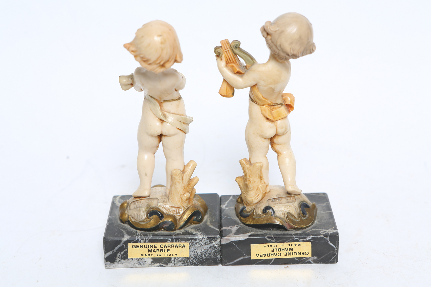 Depose Italy Cherub Figurines on Carrara Marble