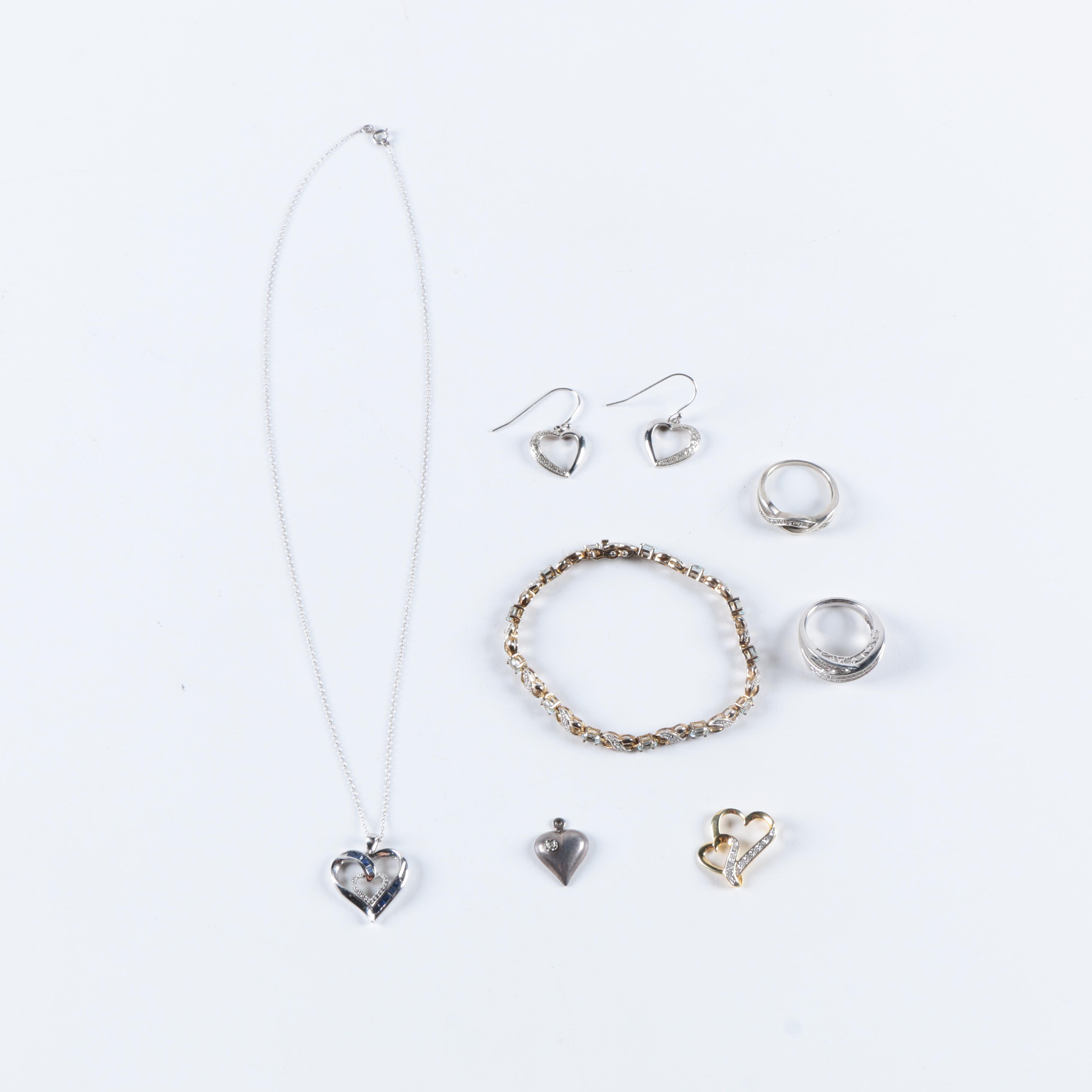 Assortment of Sterling Silver Jewelry Including Diamonds and Other Gemstones