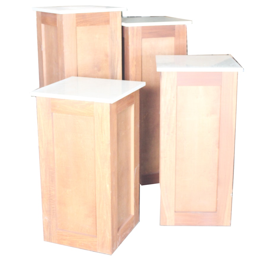 Four Marble Topped Display Columns