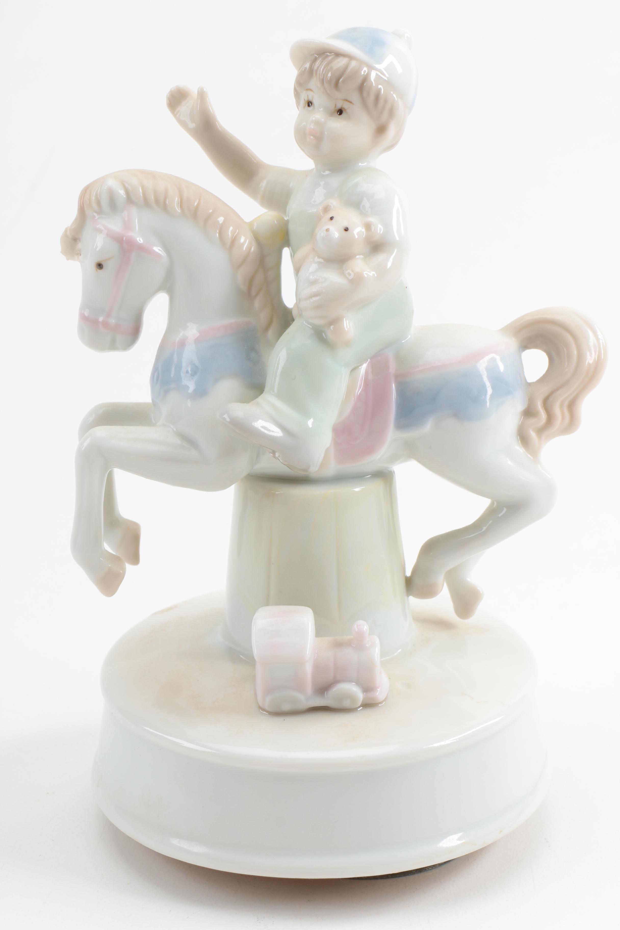 Set of Arnart Figurine Music Boxes