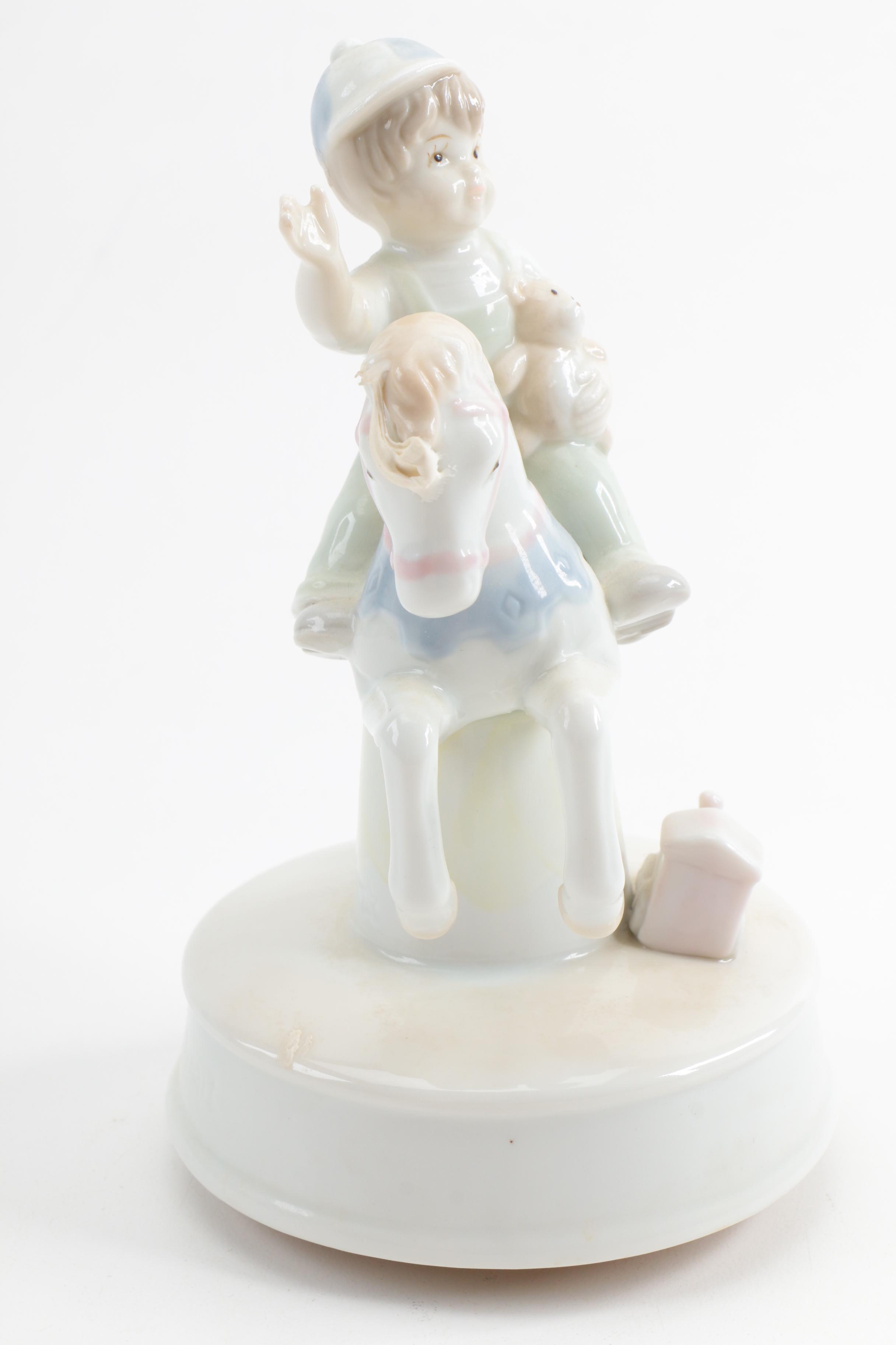 Set of Arnart Figurine Music Boxes