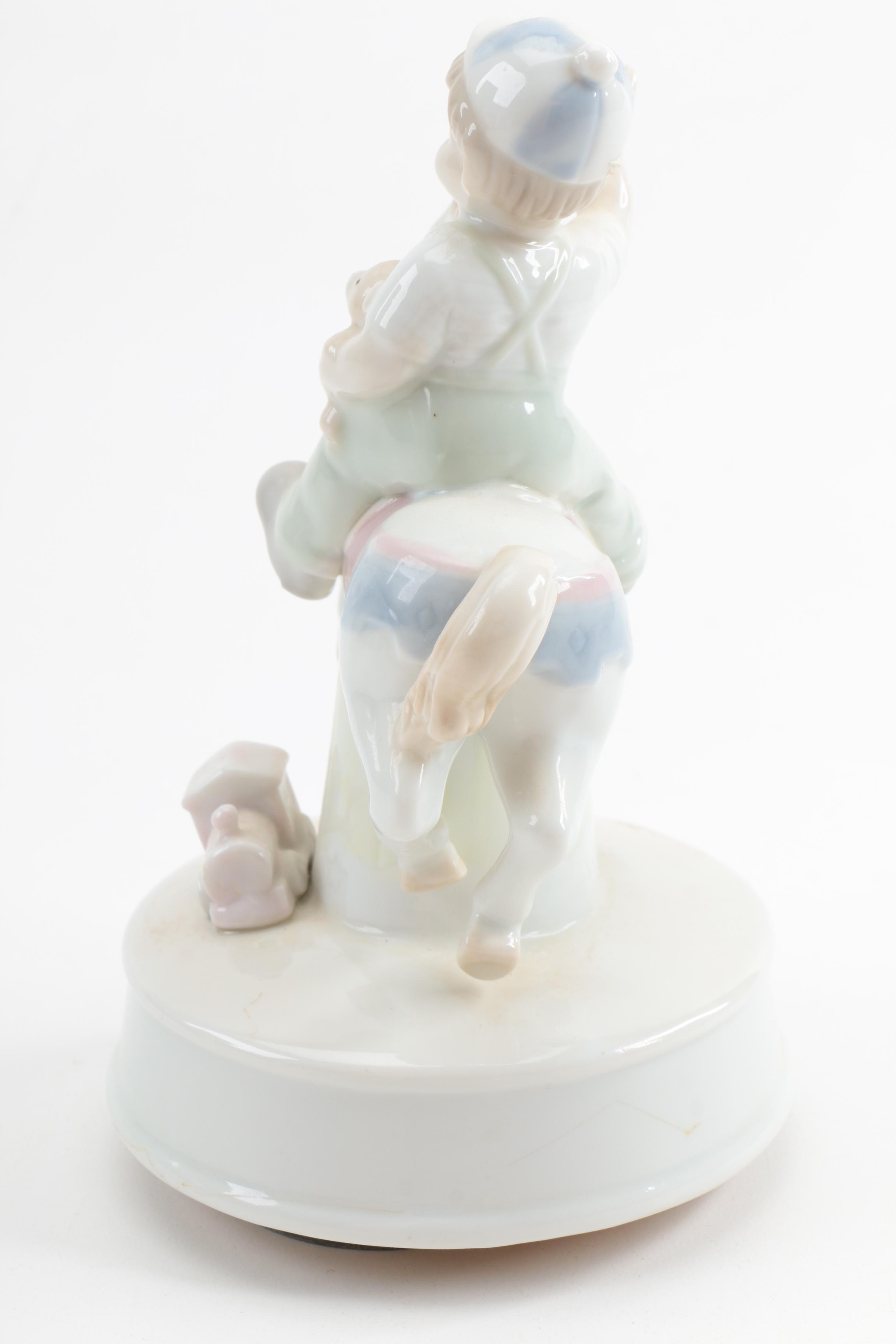 Set of Arnart Figurine Music Boxes