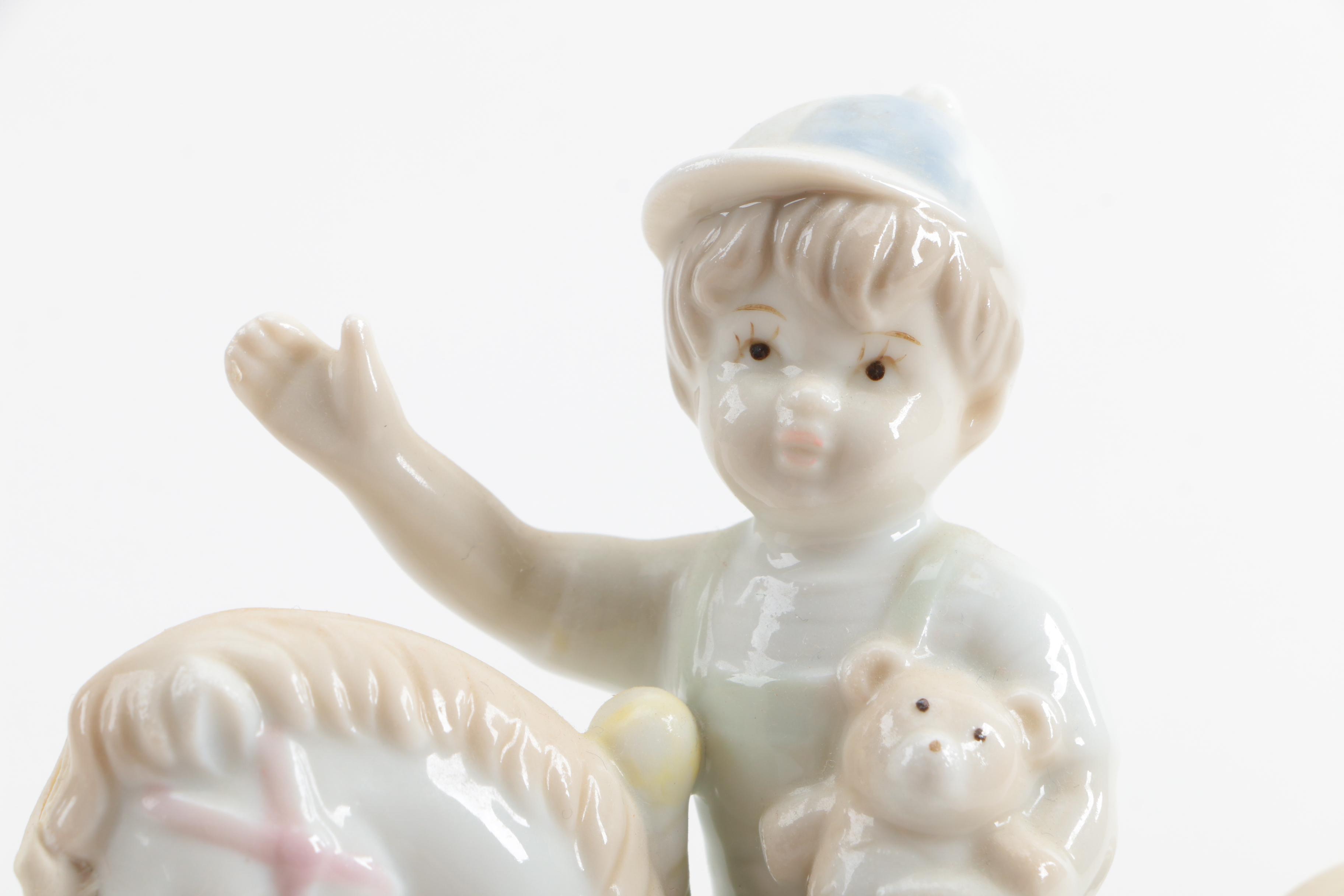 Set of Arnart Figurine Music Boxes