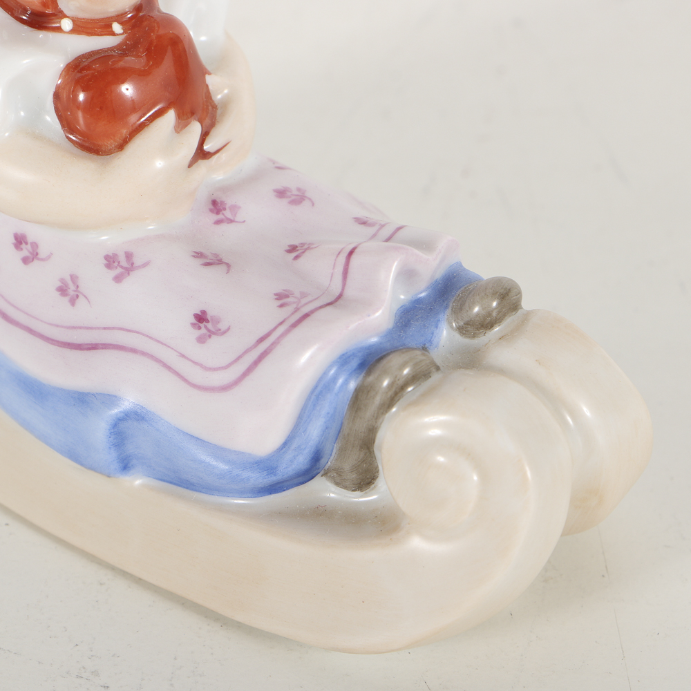 Herend Porcelain Girl On Sled Figurine