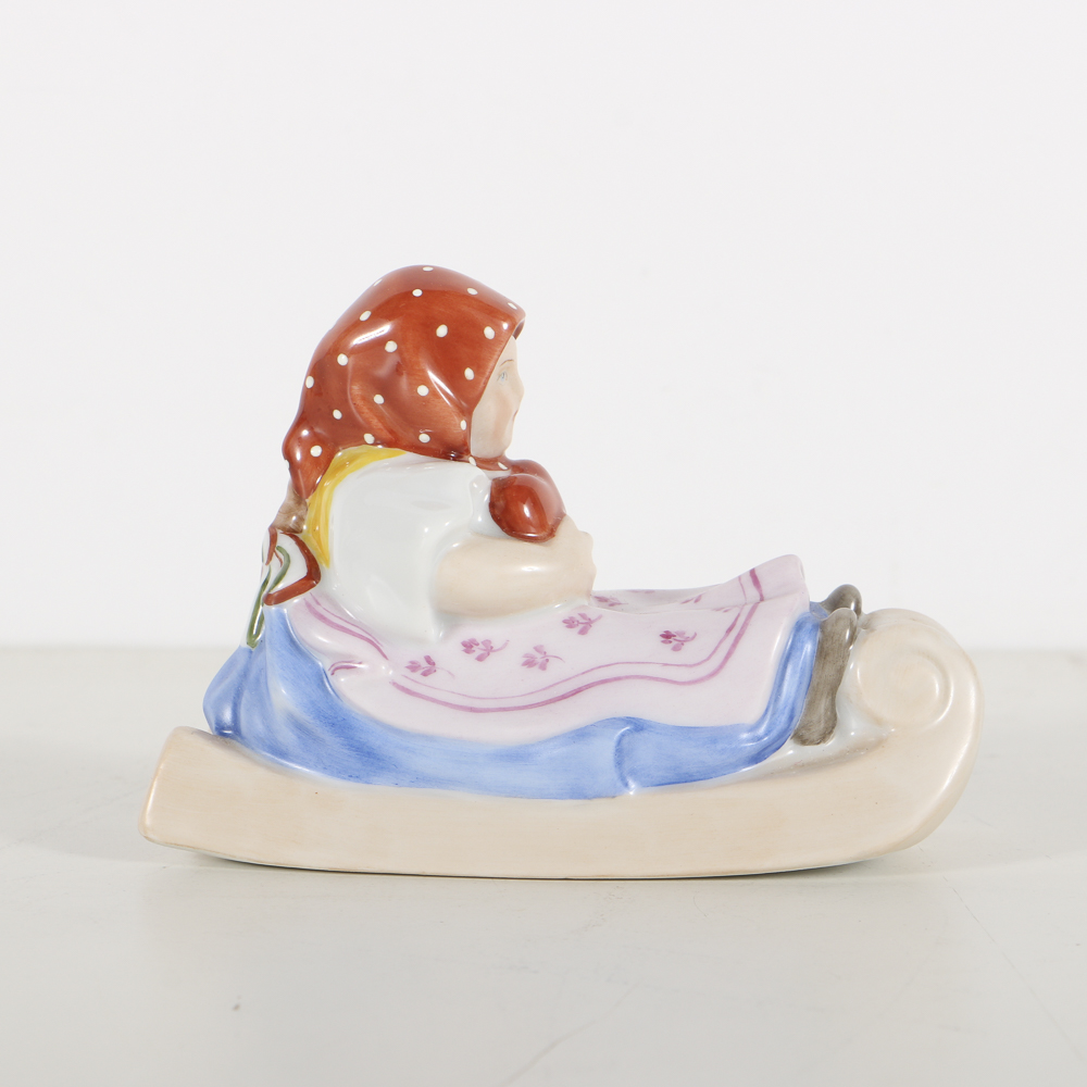 Herend Porcelain Girl On Sled Figurine