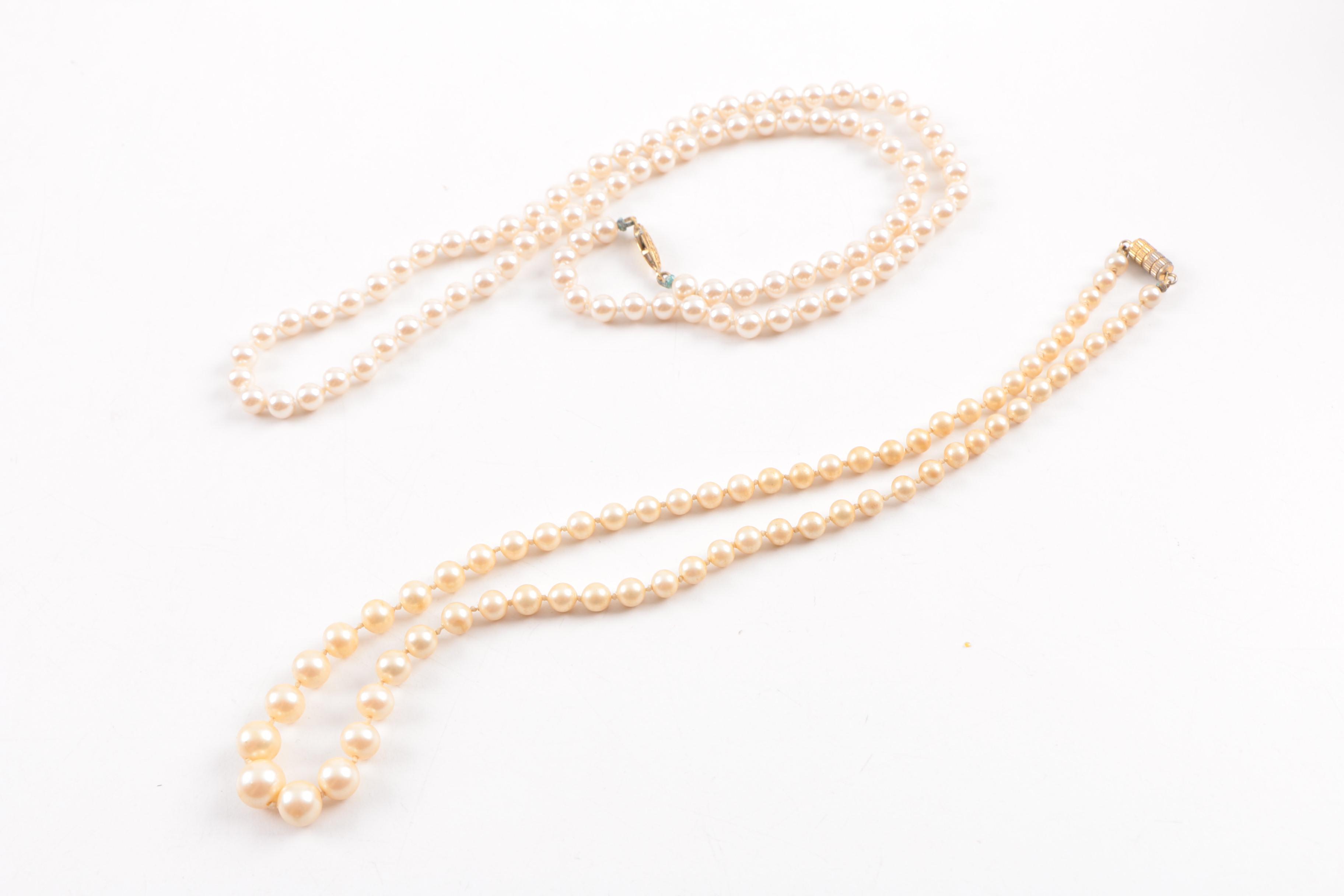 Assortment of Costume Jewelry Featuring Pearls and Gemstones