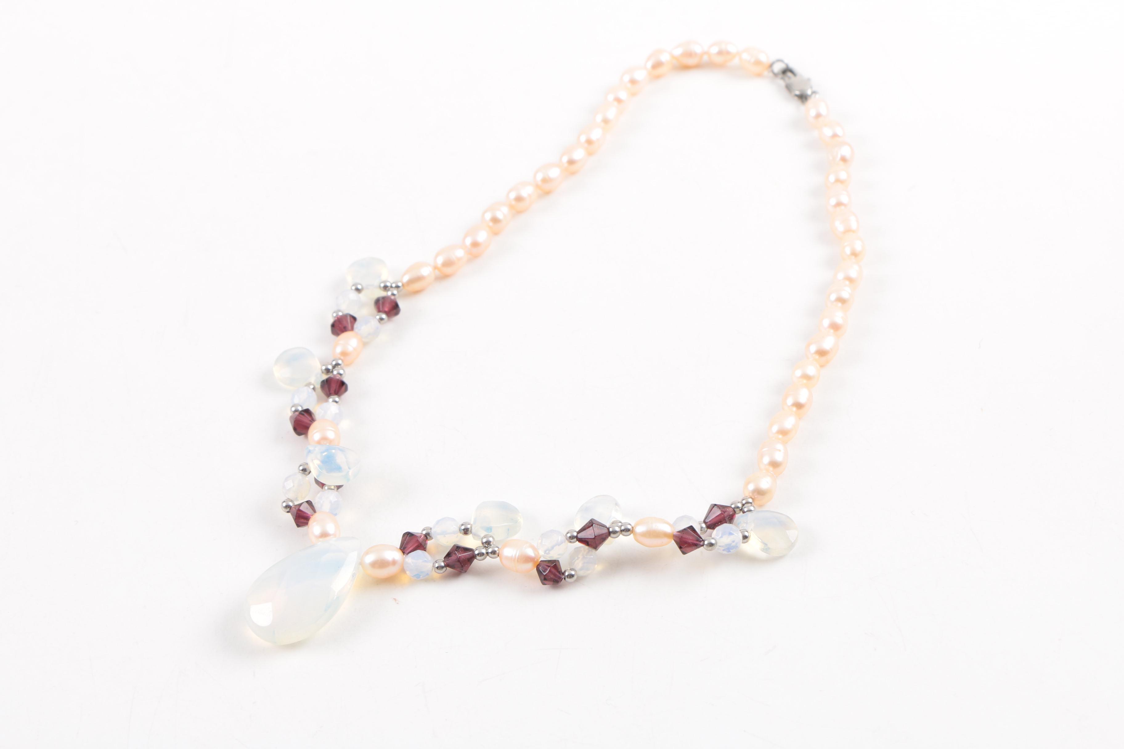 Assortment of Costume Jewelry Featuring Pearls and Gemstones