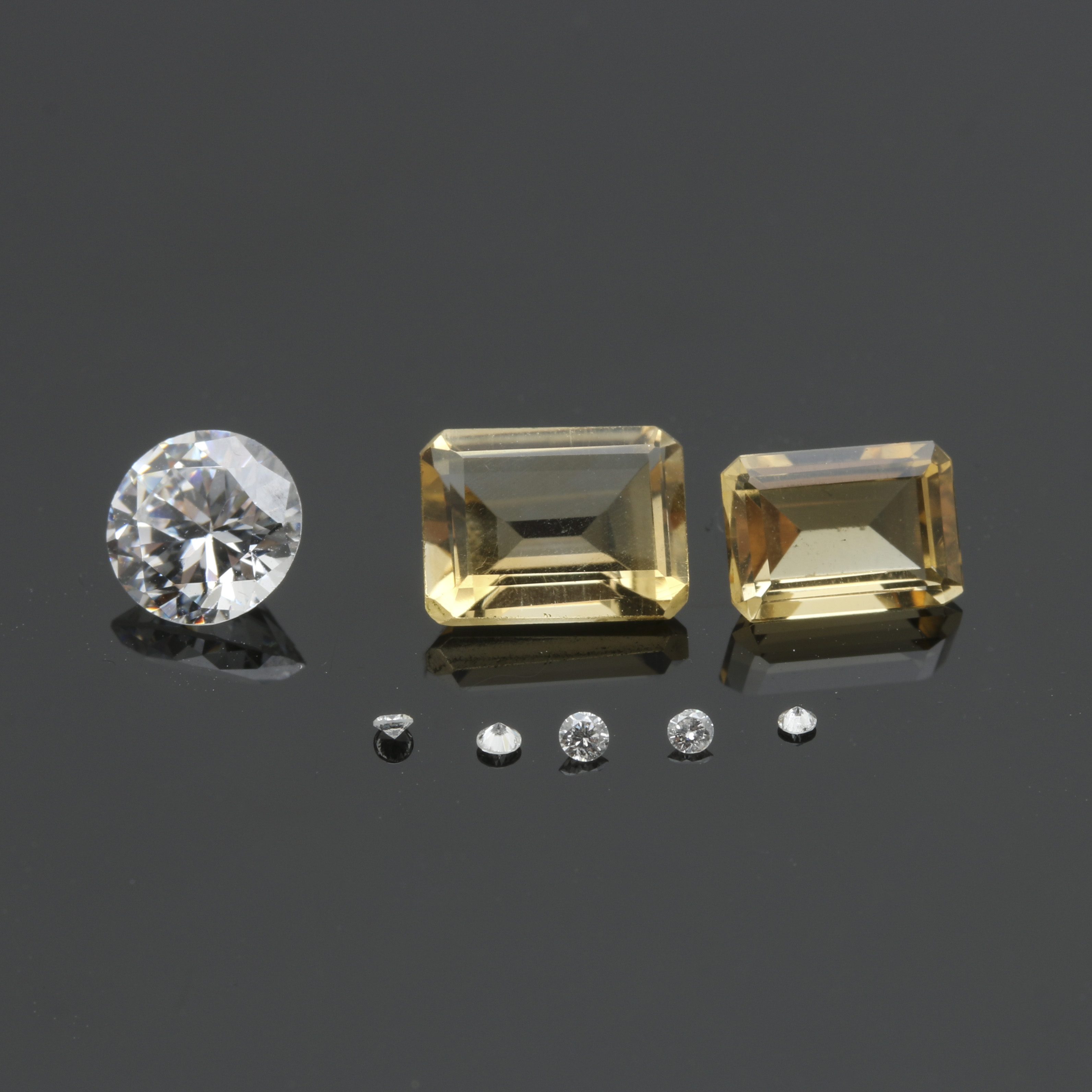 Loose Citrine, White Zircon, and Diamond Gemstones