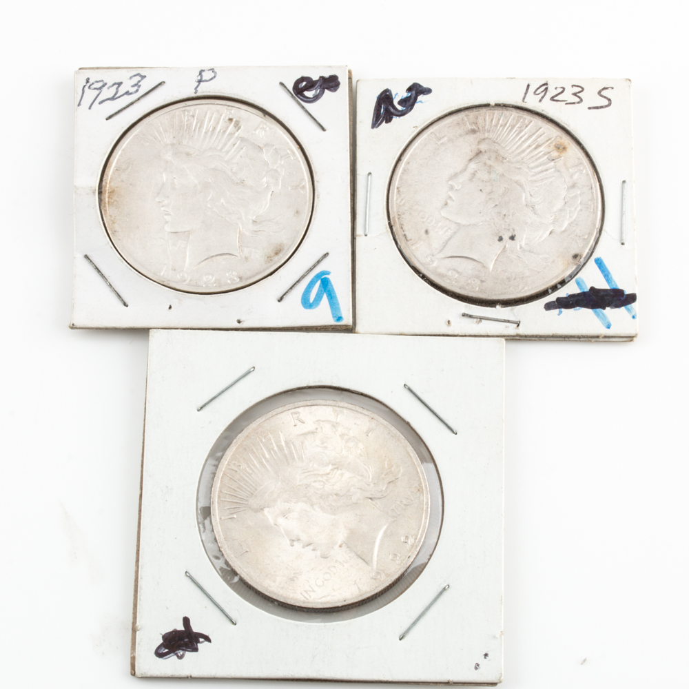 Three Peace Silver Dollars