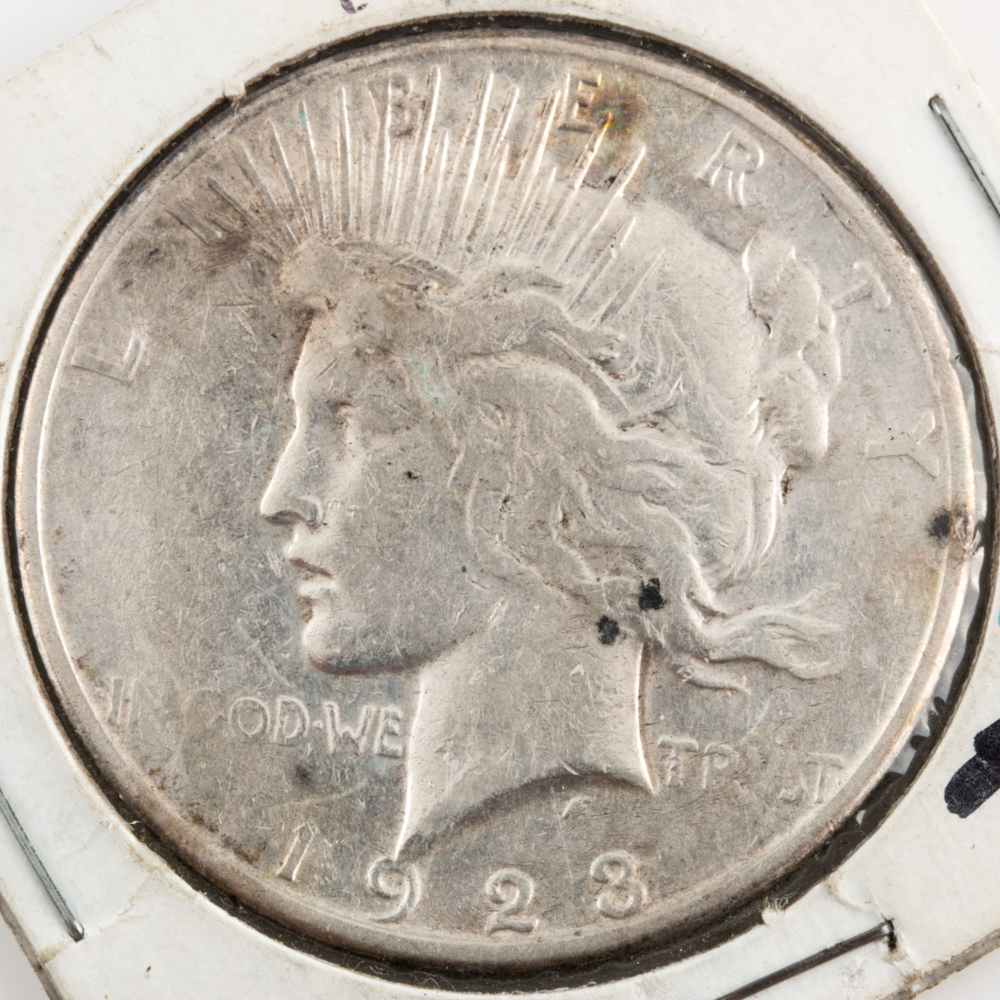 Three Peace Silver Dollars