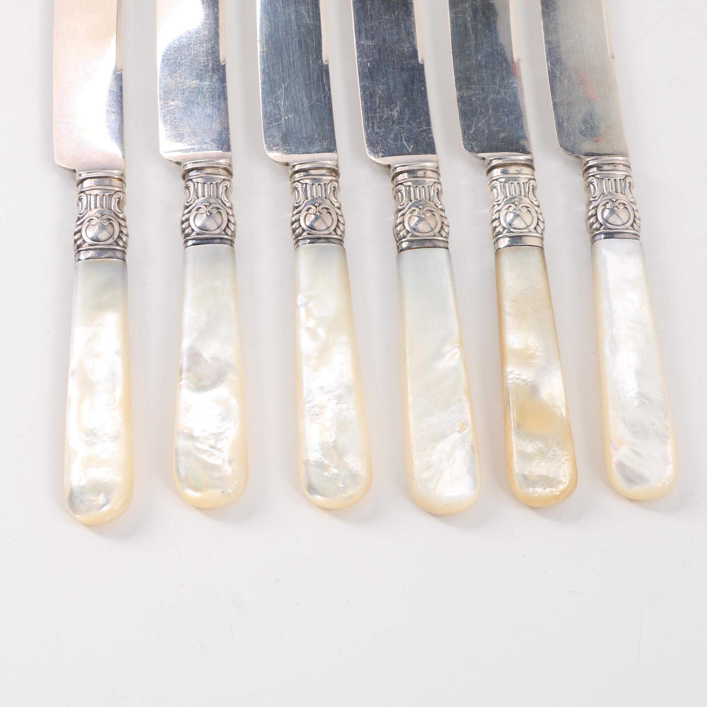 Six Mother of Pearl Handled Dessert Knives with Sterling Bolsters