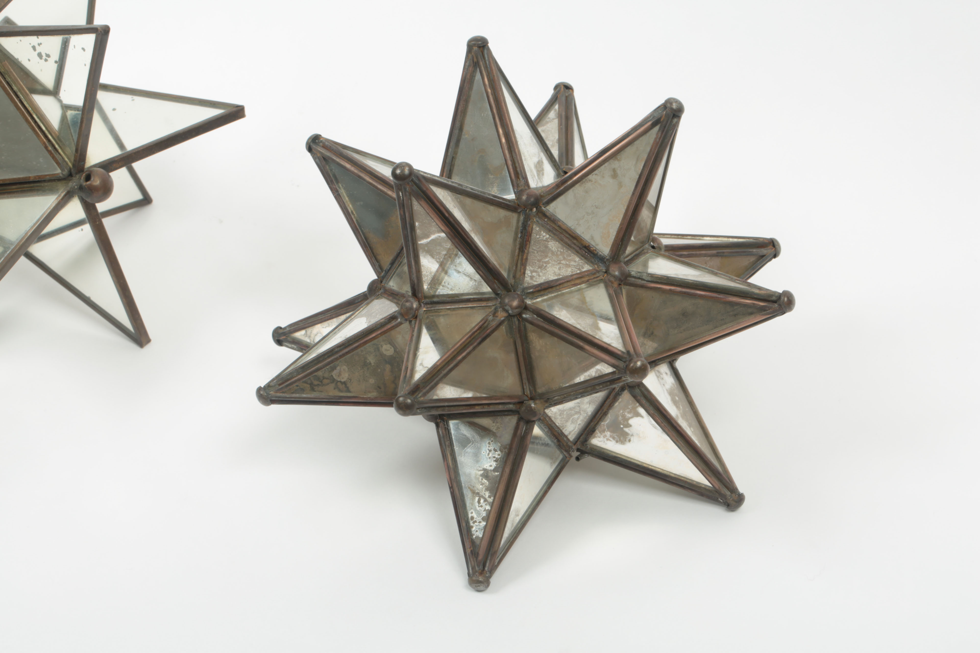 Metal and Mirrored Glass Star Sculptures