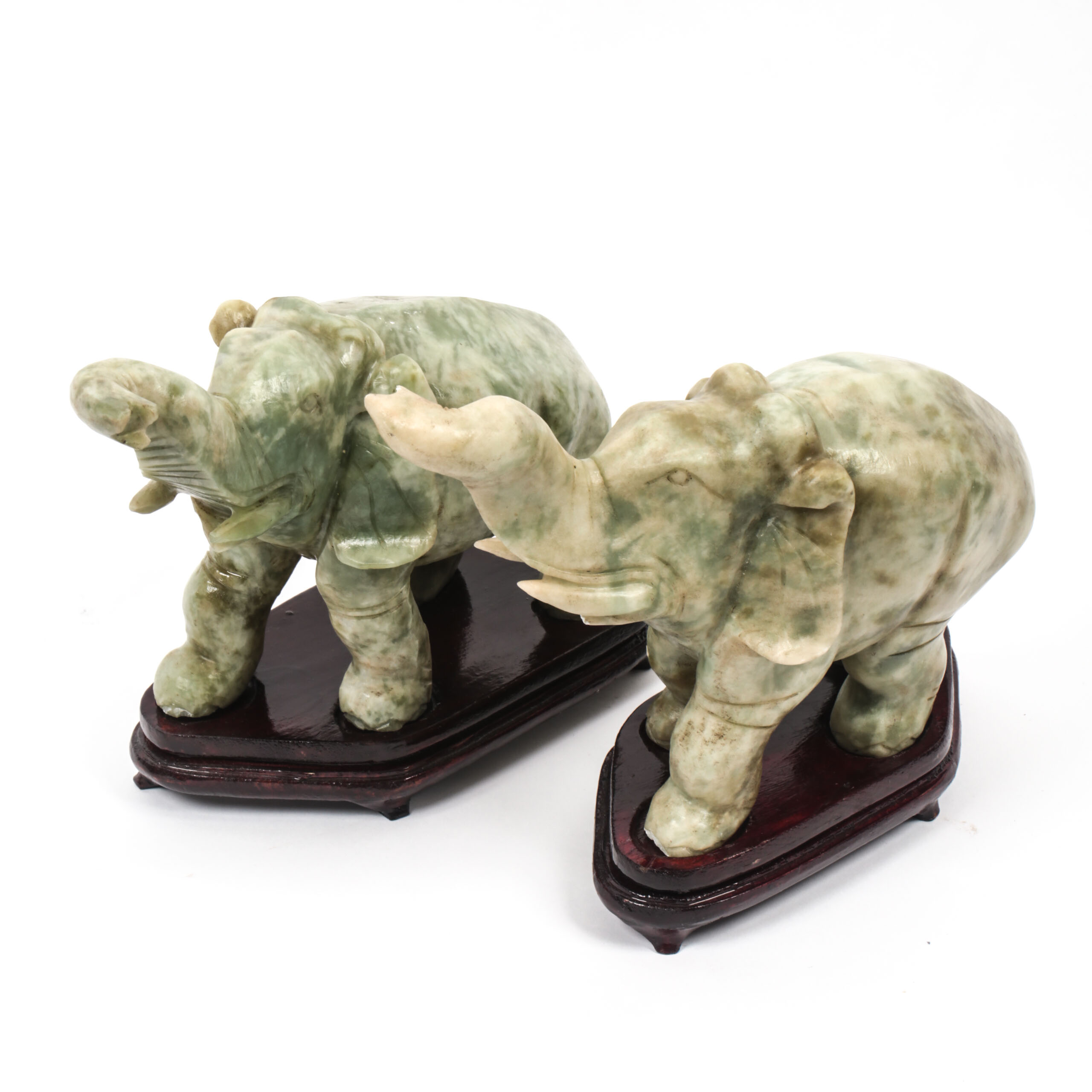 Pair of Carved Green Stone Elephants
