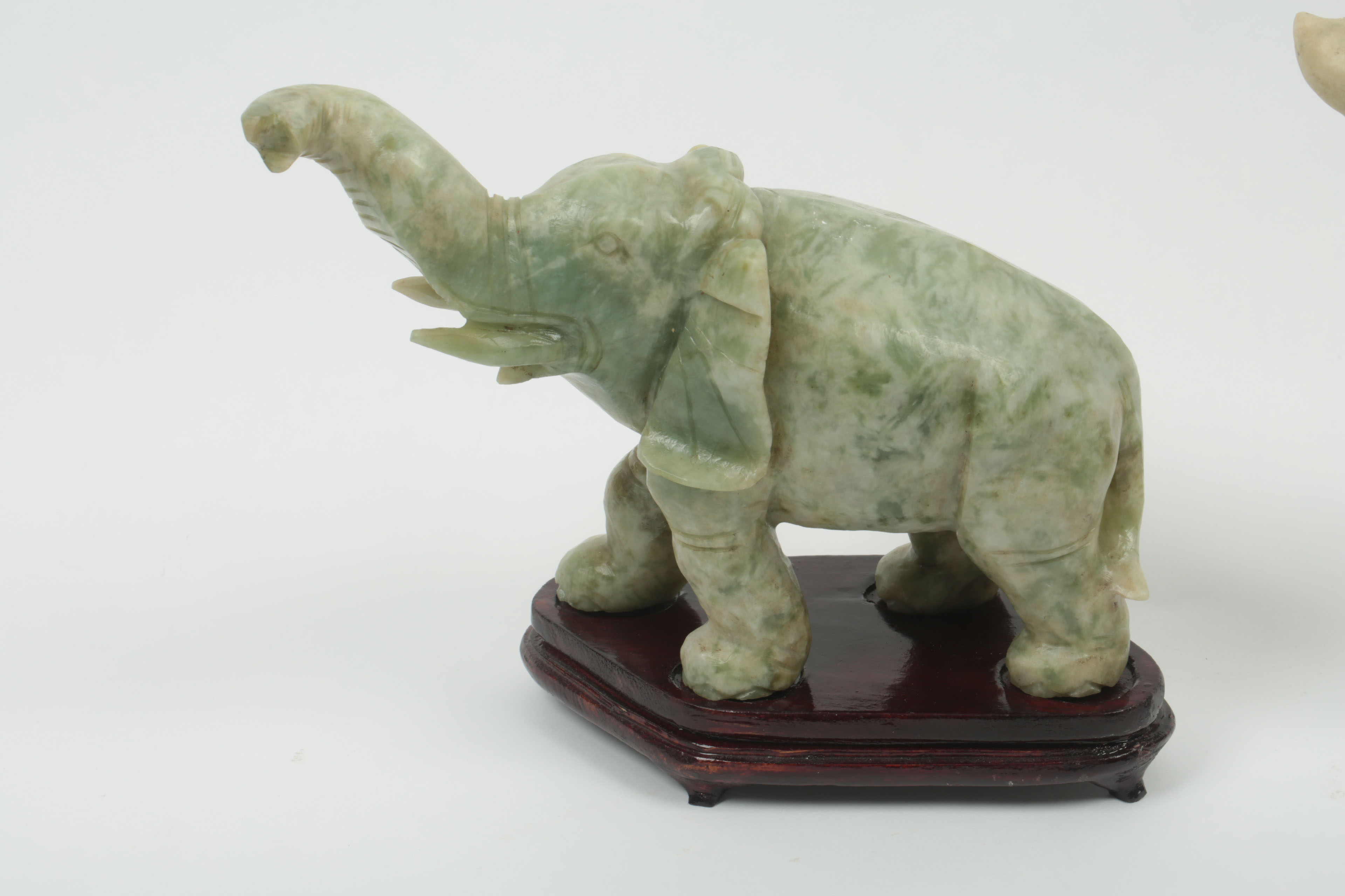 Pair of Carved Green Stone Elephants