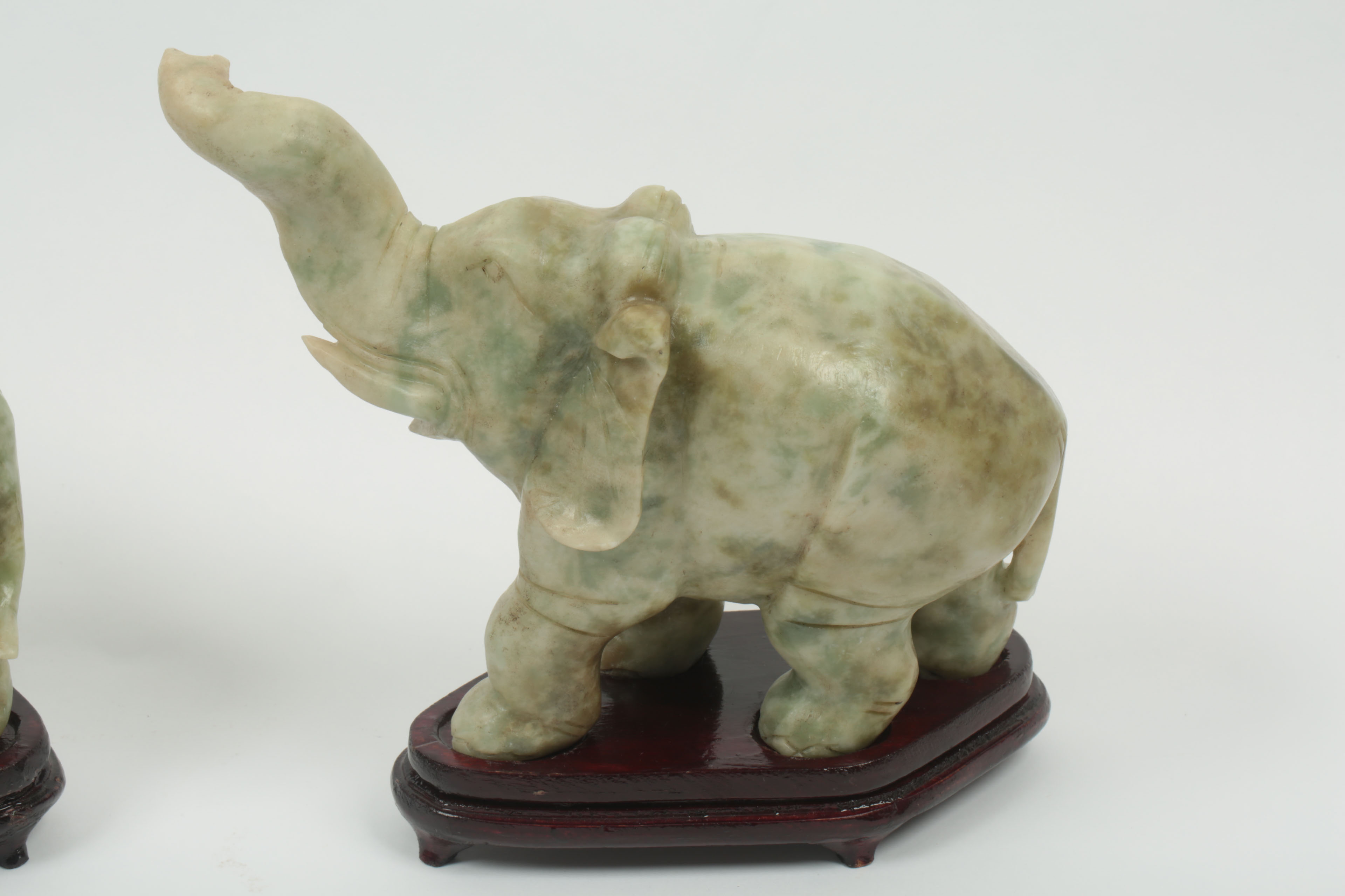 Pair of Carved Green Stone Elephants