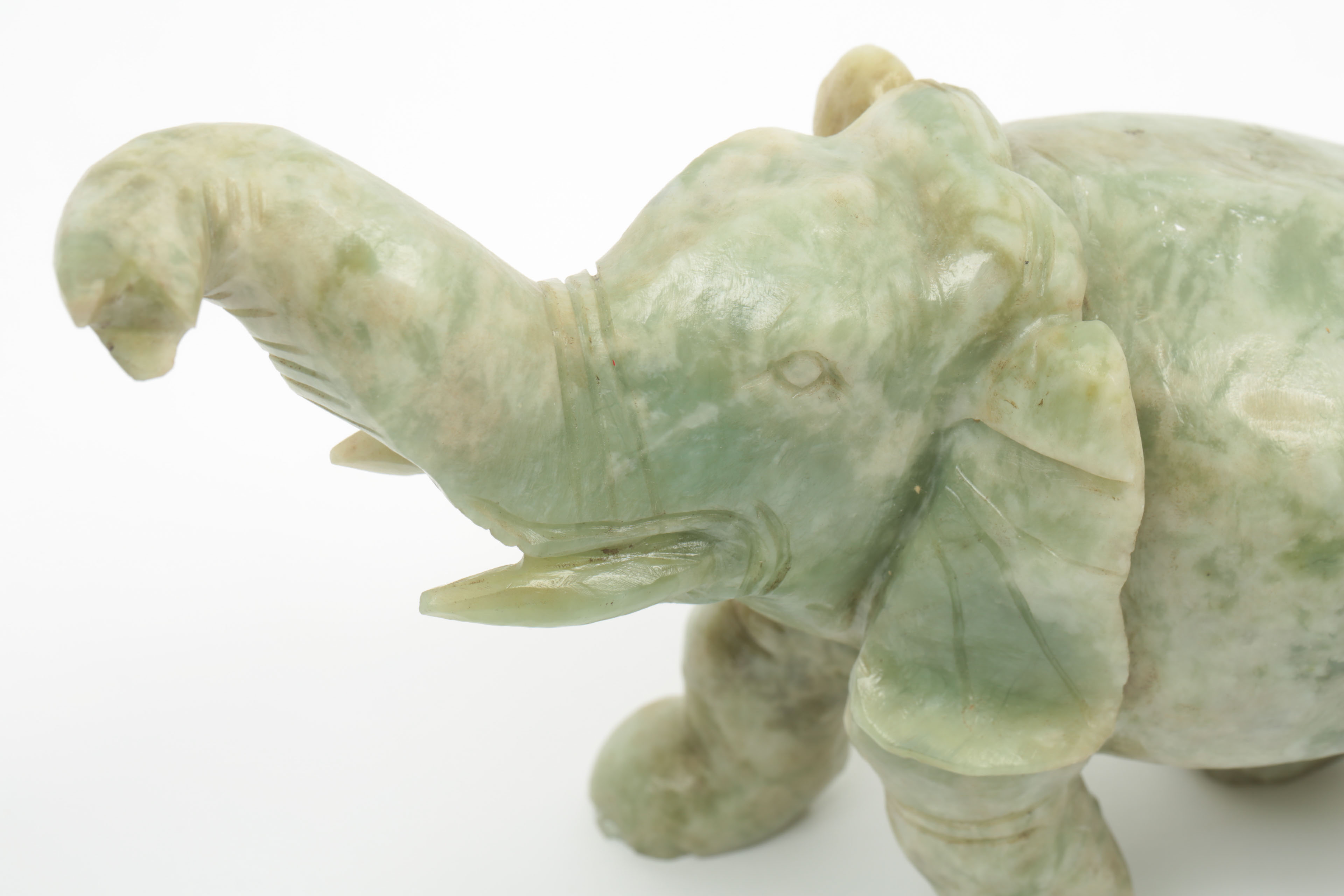 Pair of Carved Green Stone Elephants