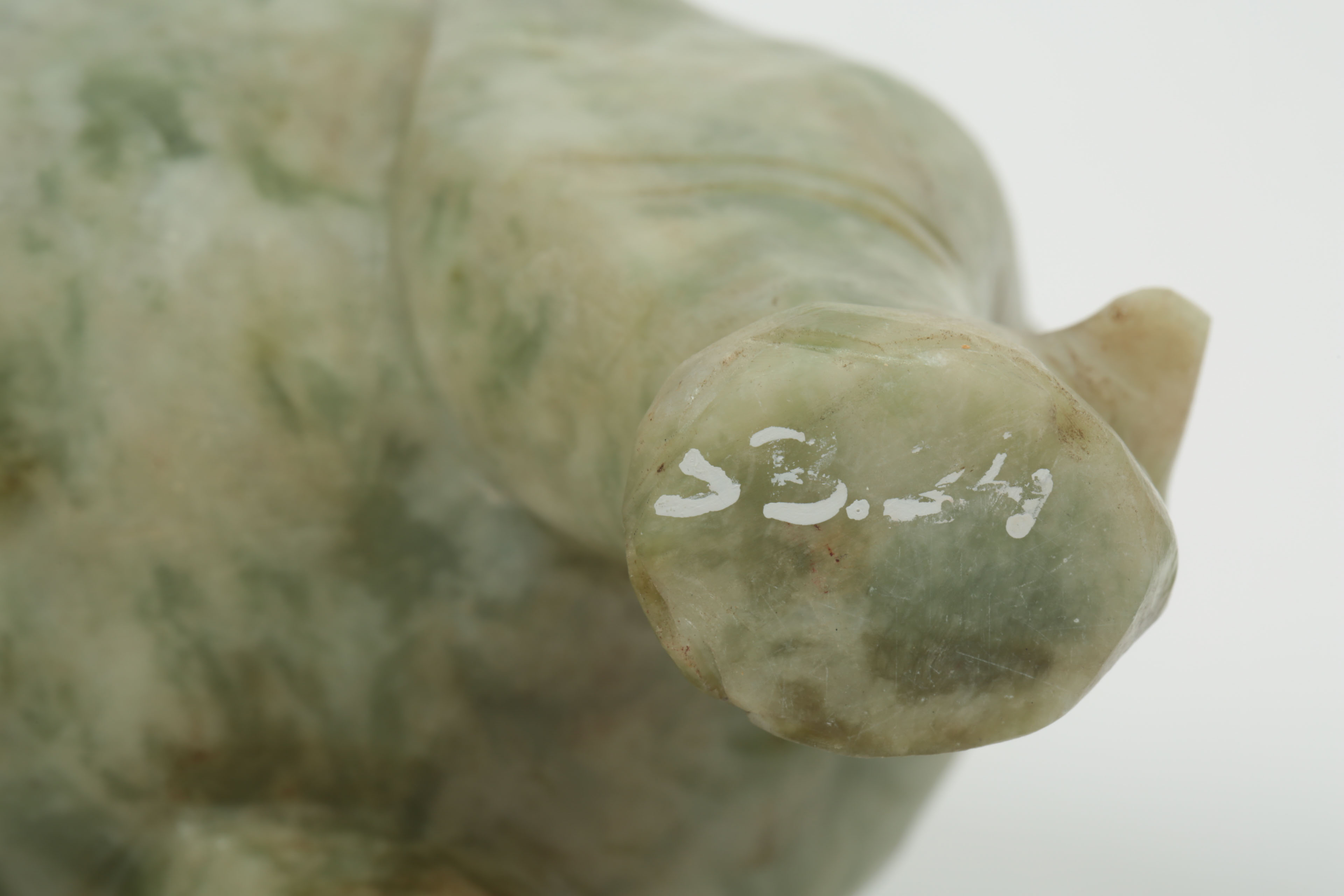 Pair of Carved Green Stone Elephants