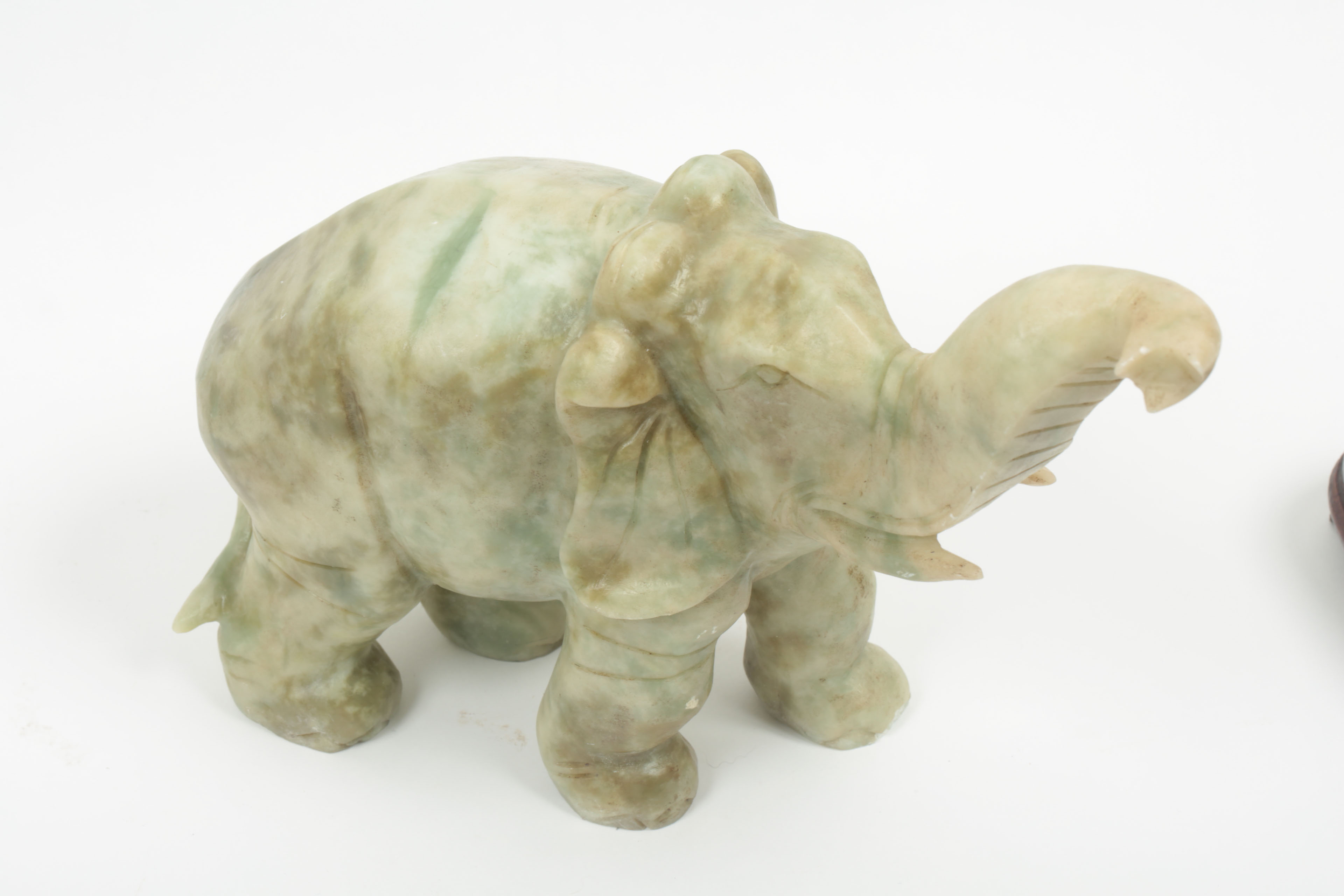 Pair of Carved Green Stone Elephants