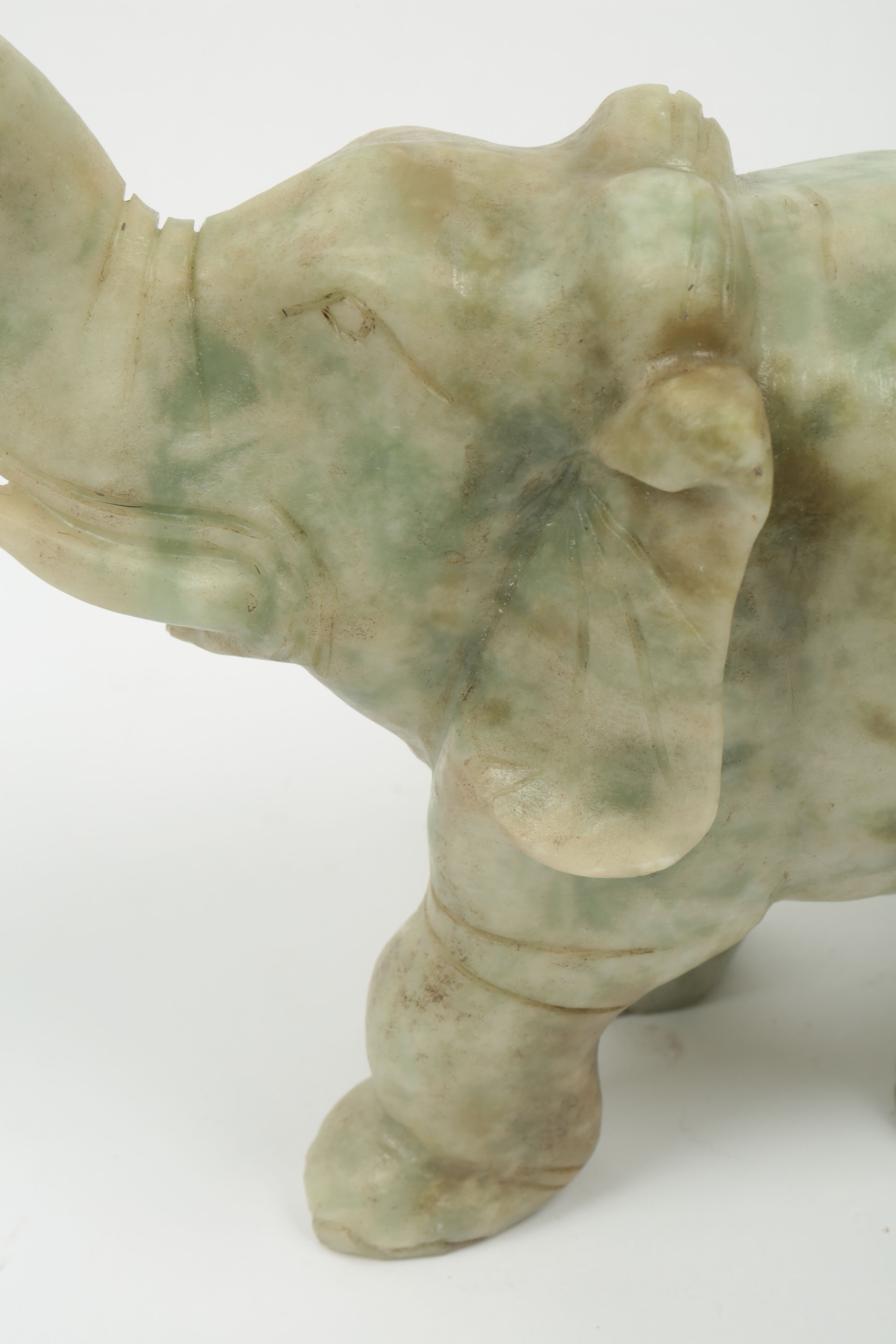 Pair of Carved Green Stone Elephants