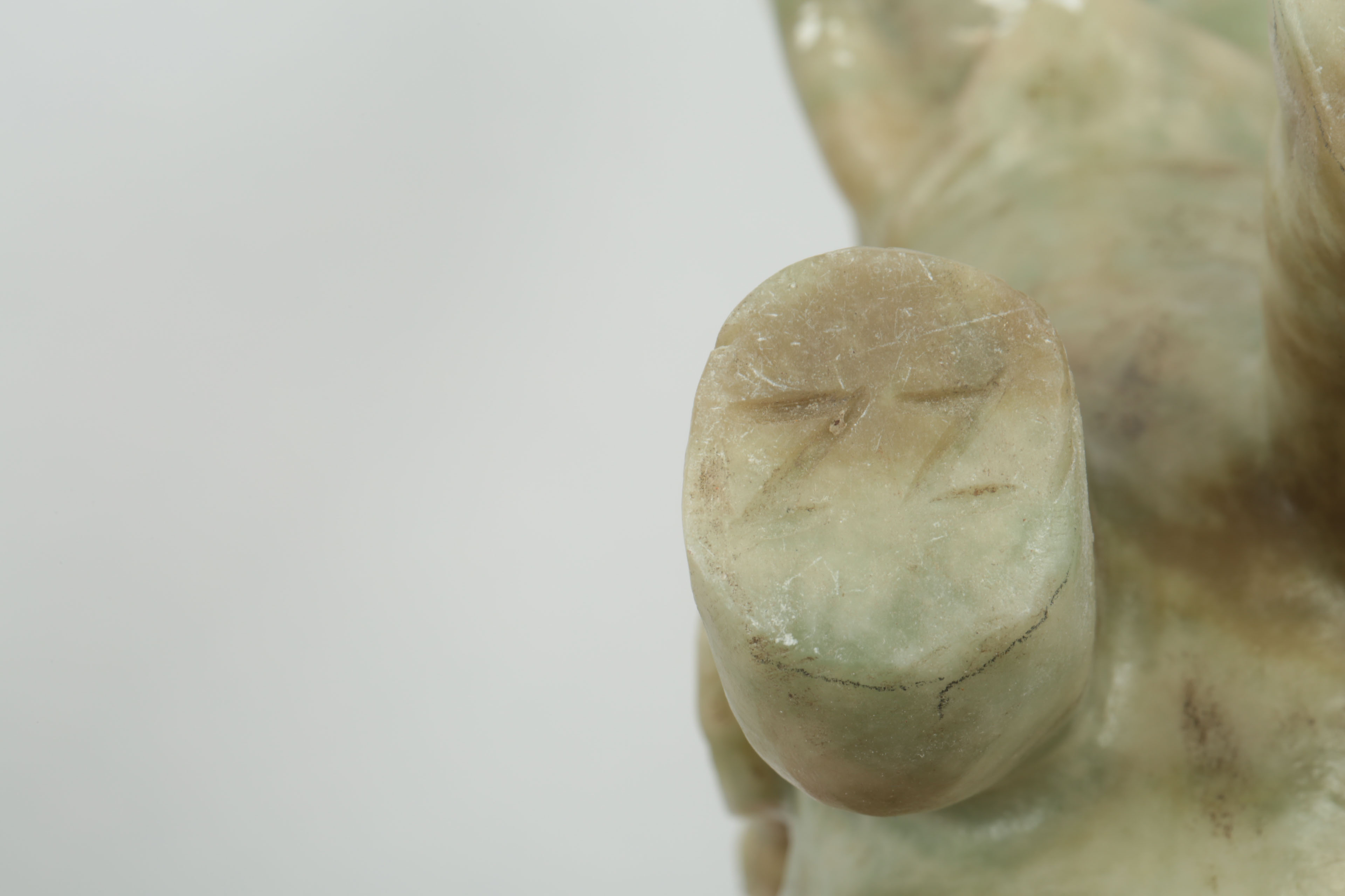 Pair of Carved Green Stone Elephants