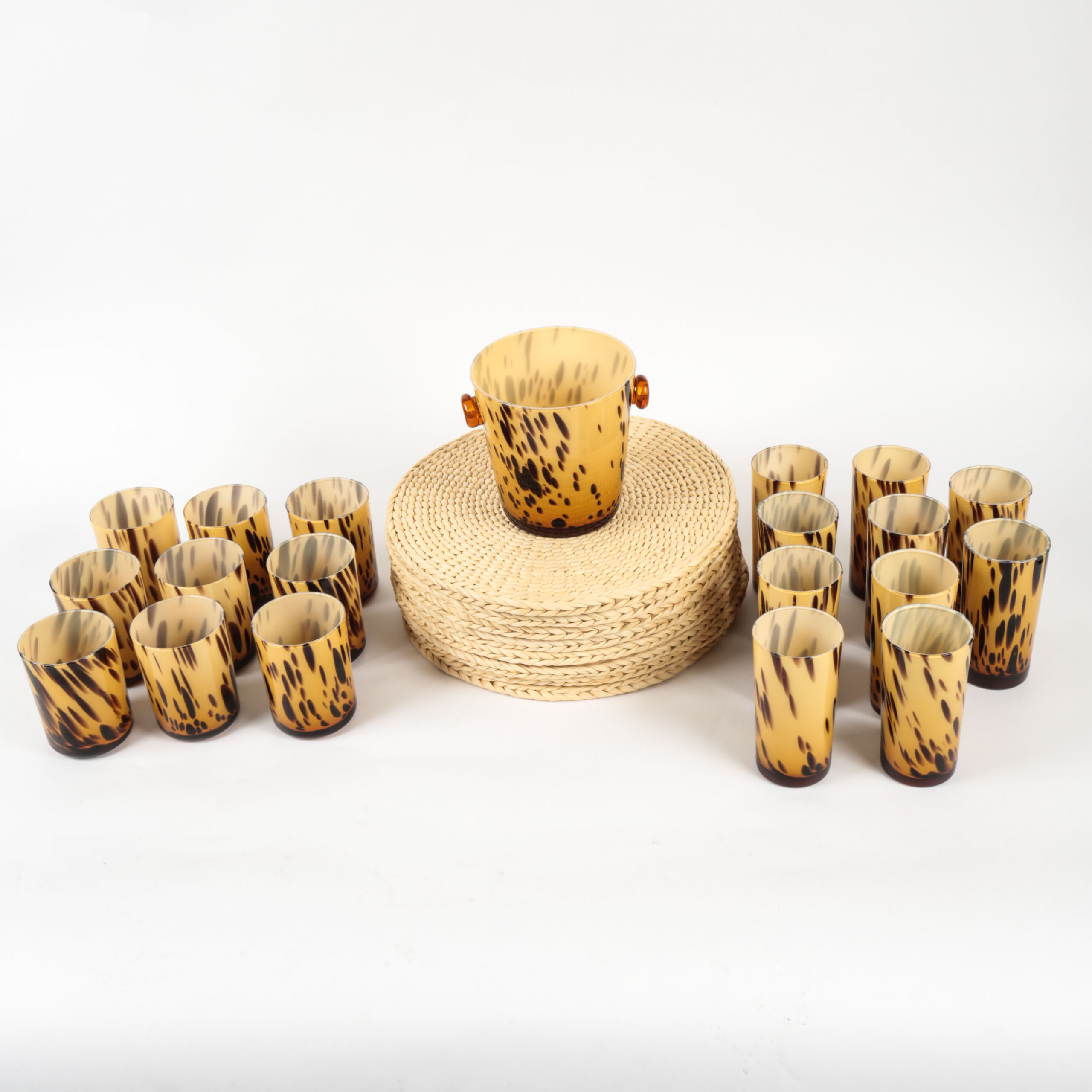 Handblown Tortoise Patterned Glass Barware and Woven Grass Table Mats