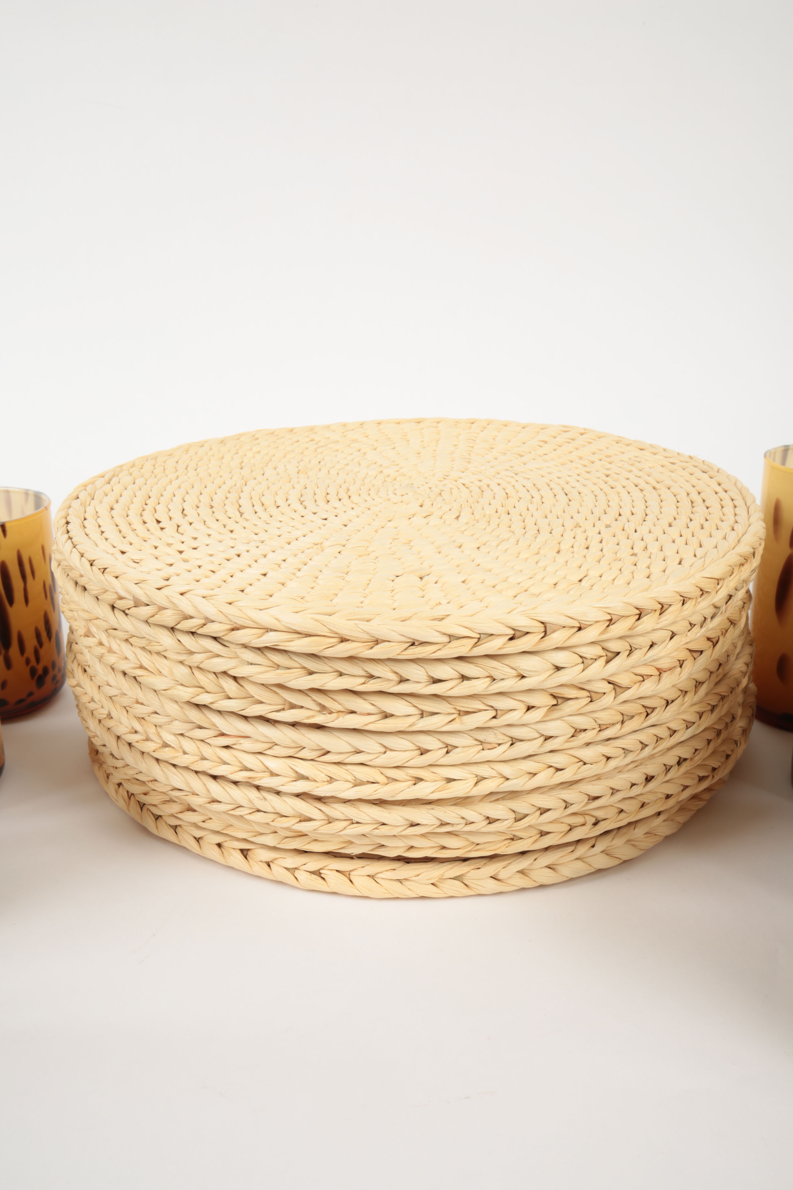 Handblown Tortoise Patterned Glass Barware and Woven Grass Table Mats