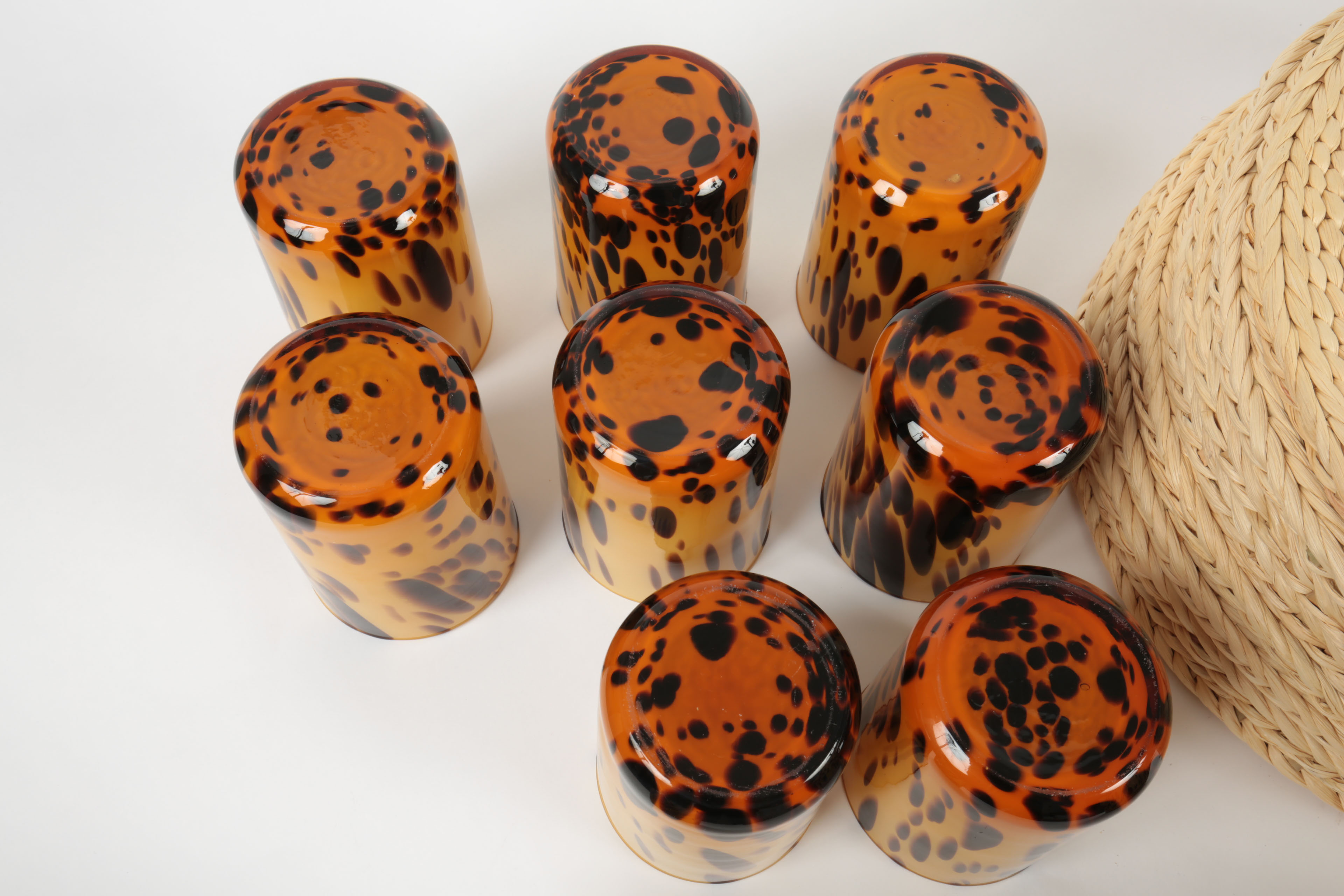 Handblown Tortoise Patterned Glass Barware and Woven Grass Table Mats