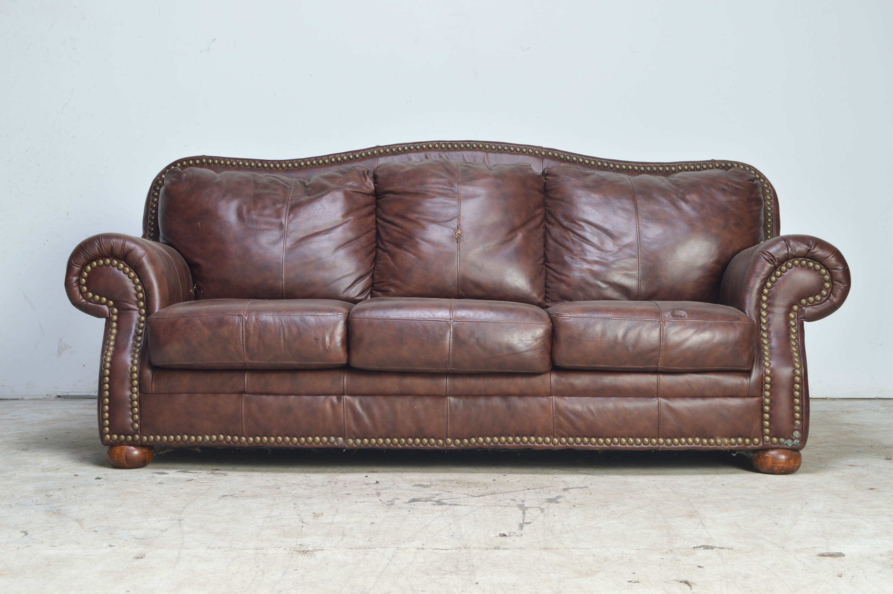 Brown Camelback Leather Sofa