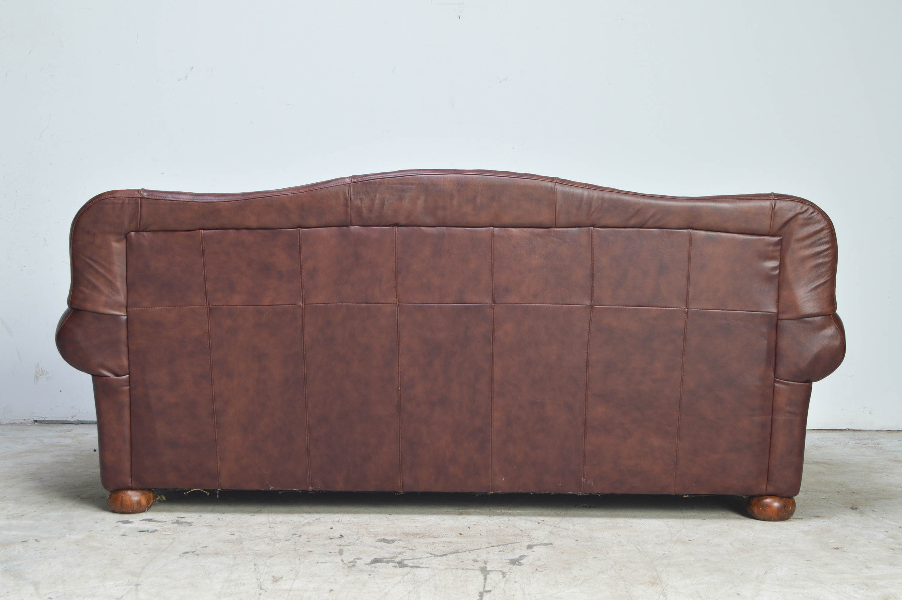 Brown Camelback Leather Sofa
