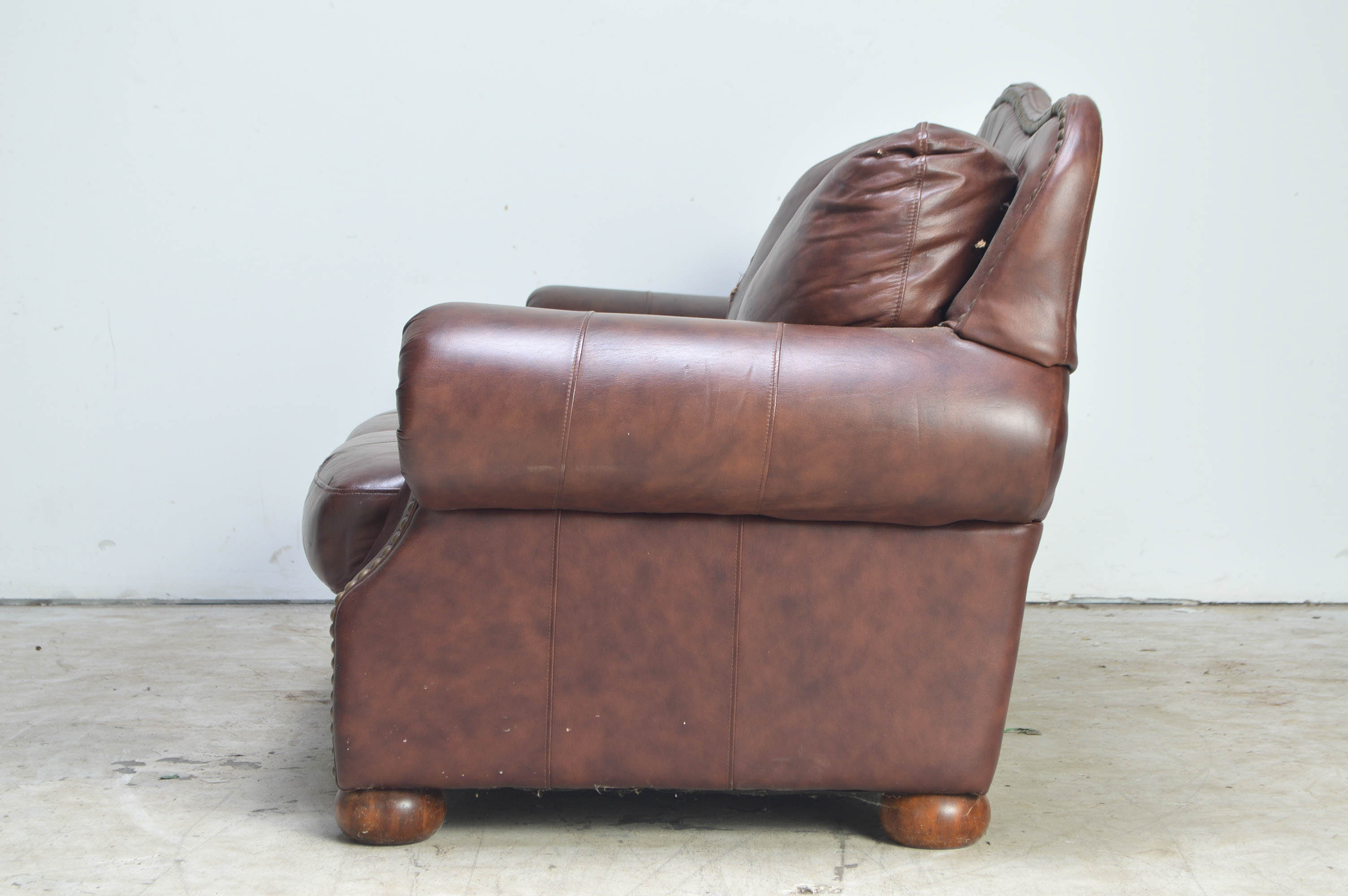 Brown Camelback Leather Sofa