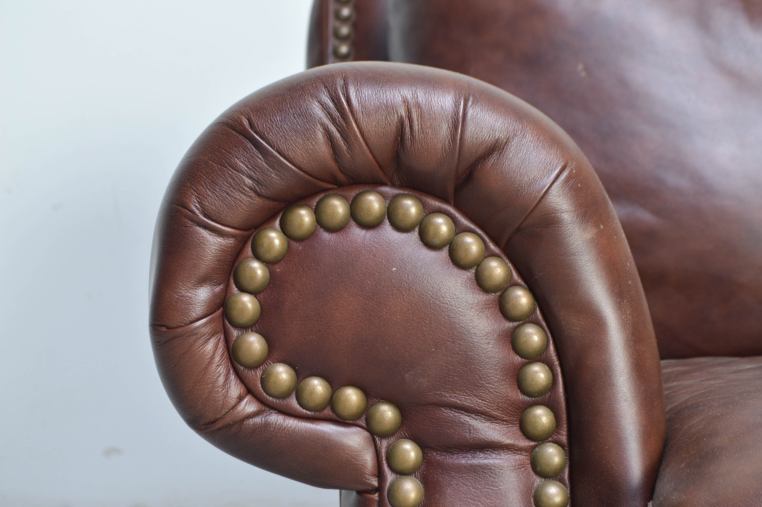 Brown Camelback Leather Sofa