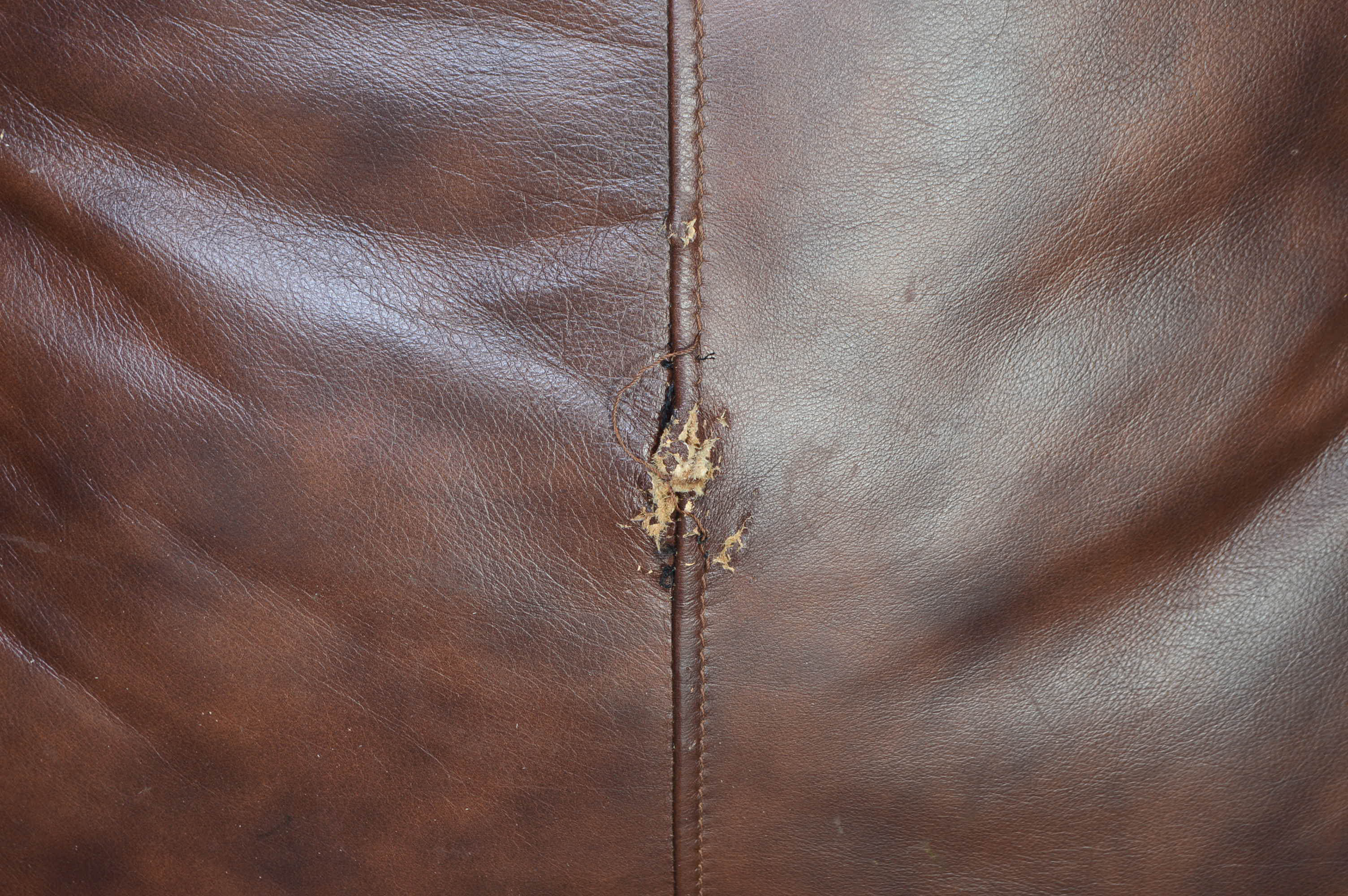 Brown Camelback Leather Sofa