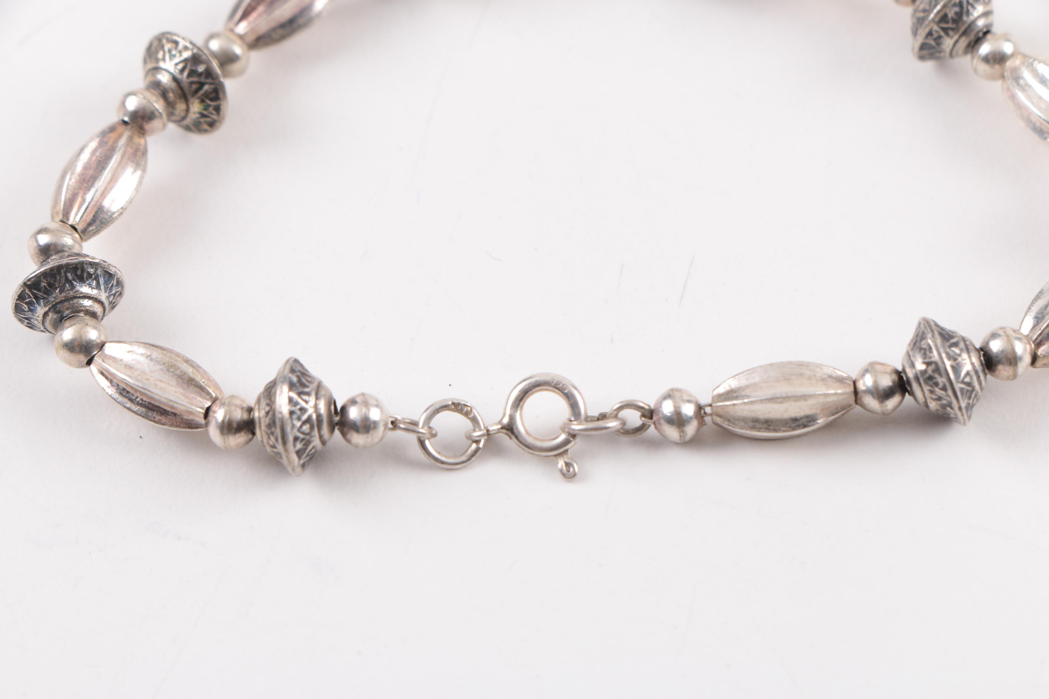 Sterling Silver Jewelry Including a Mother of Pearl Ring