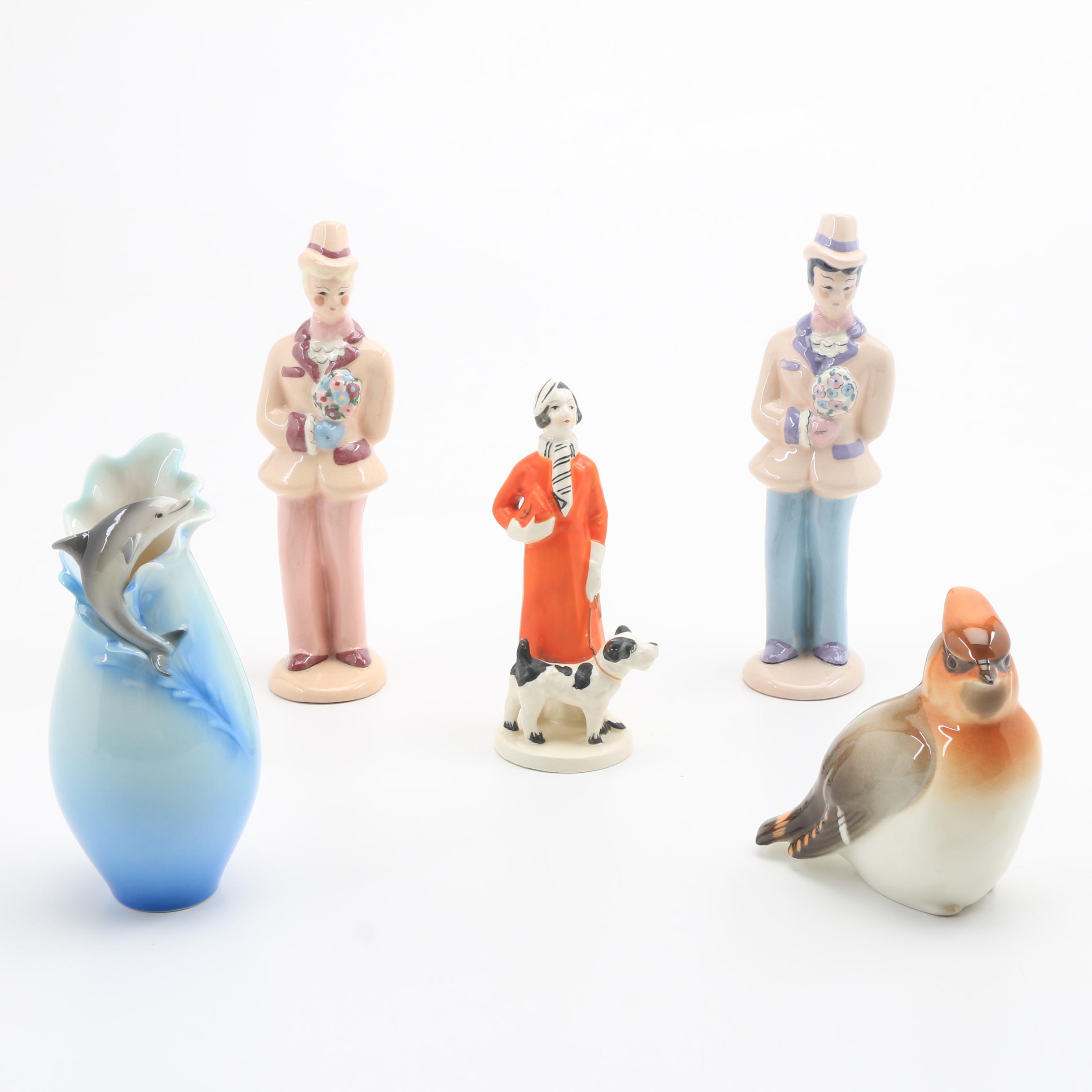 Assortment of Porcelain Figurines and a Vase