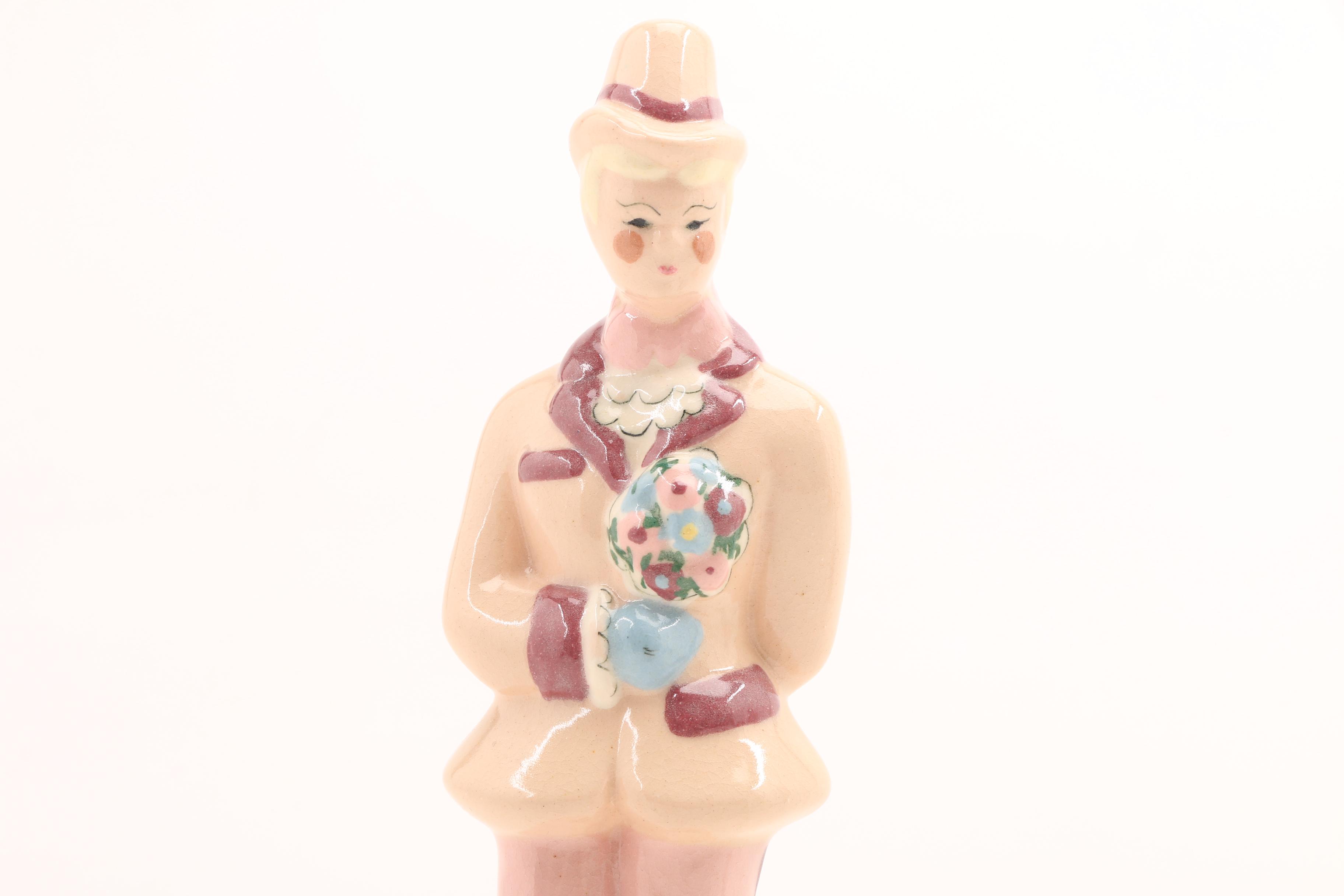 Assortment of Porcelain Figurines and a Vase