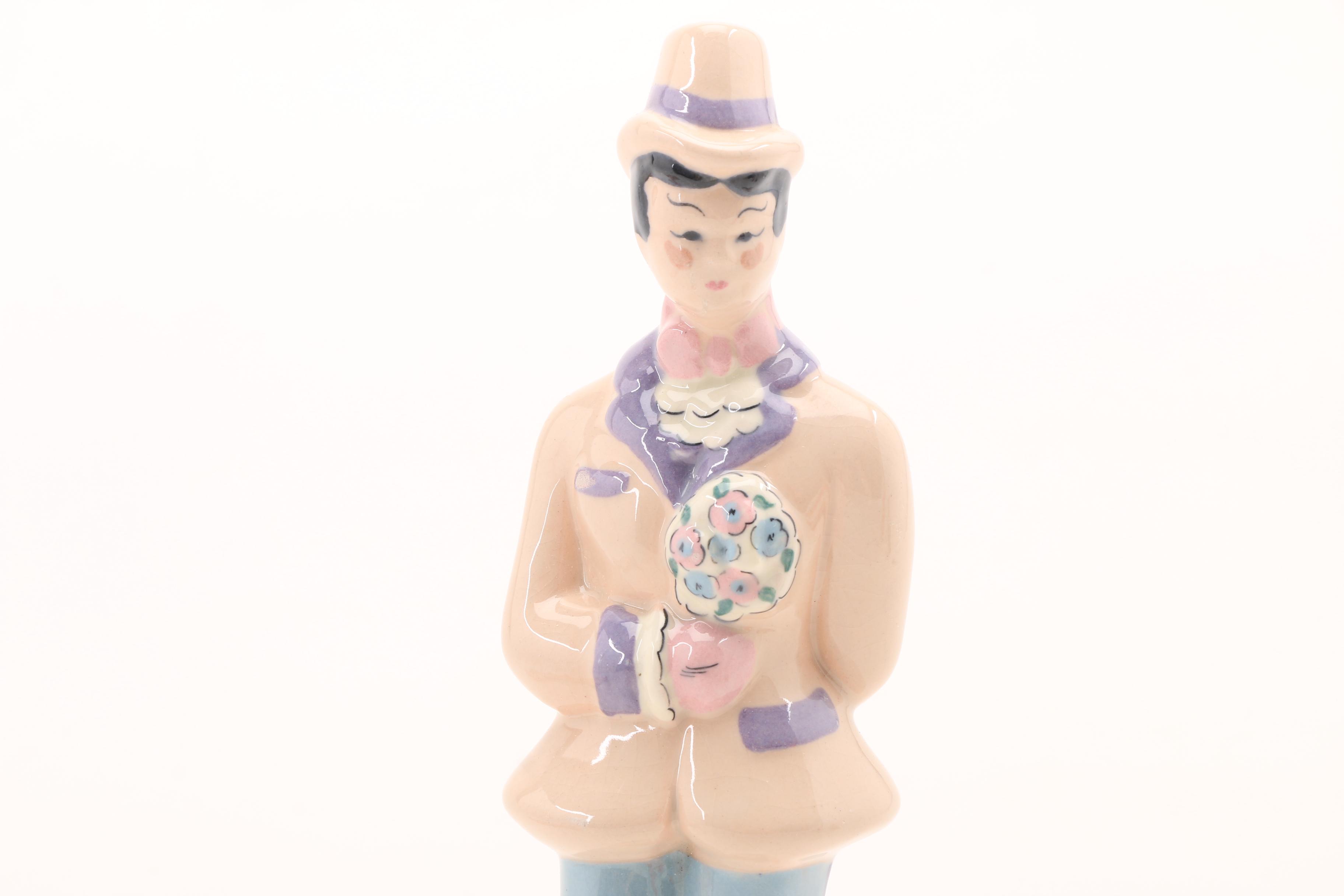 Assortment of Porcelain Figurines and a Vase