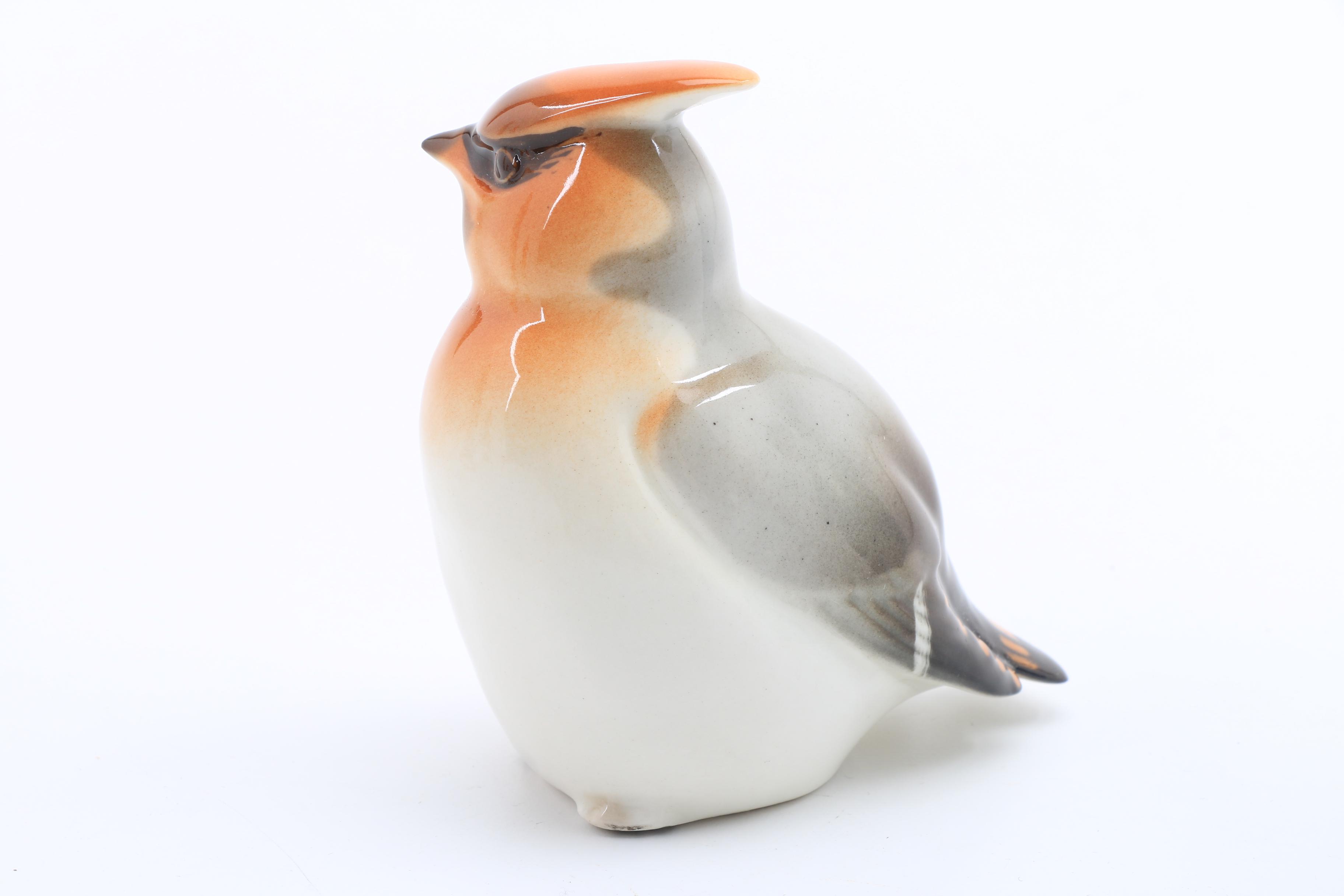 Assortment of Porcelain Figurines and a Vase