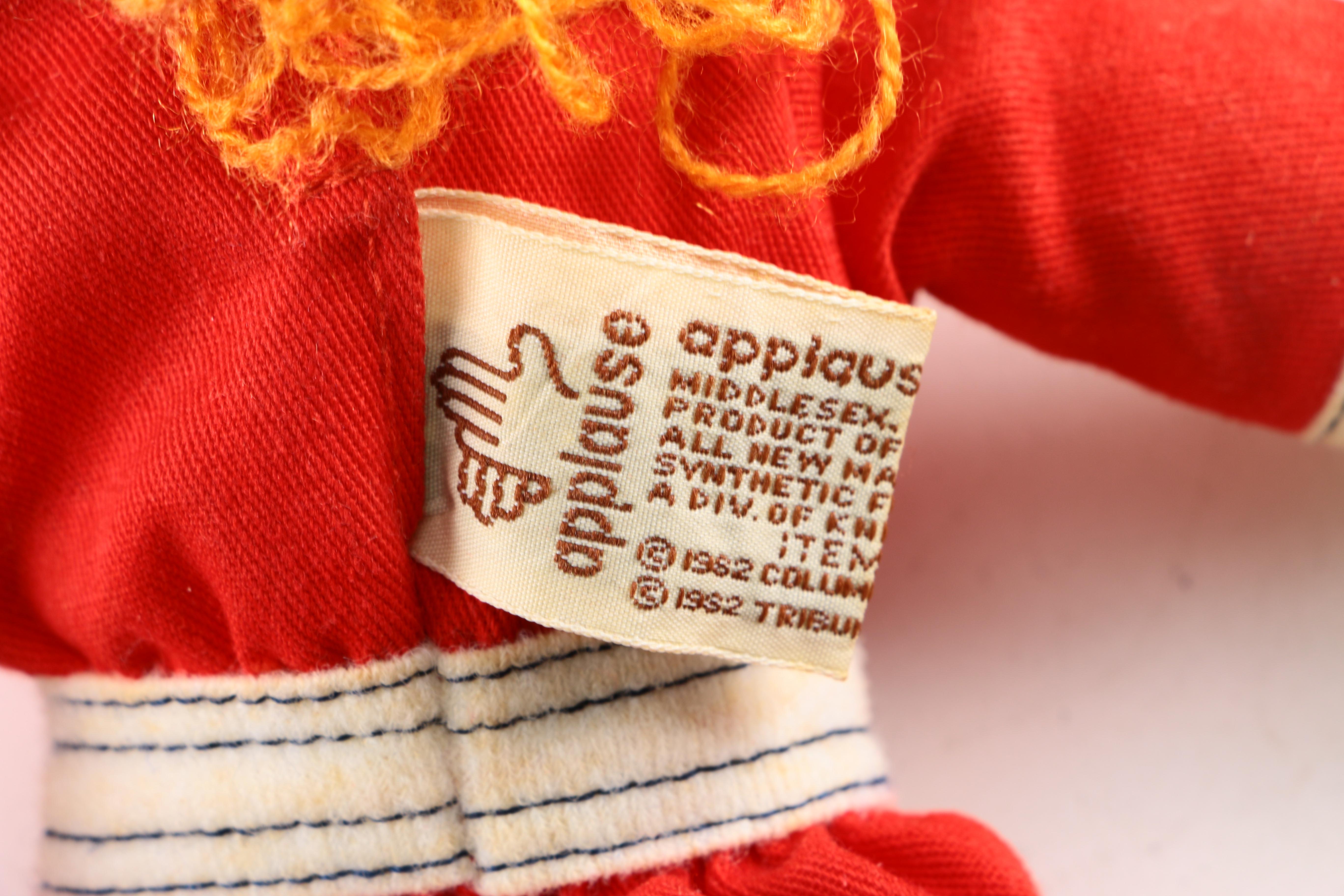 Dolls and Stuffed Animals Featuring an Annie Doll