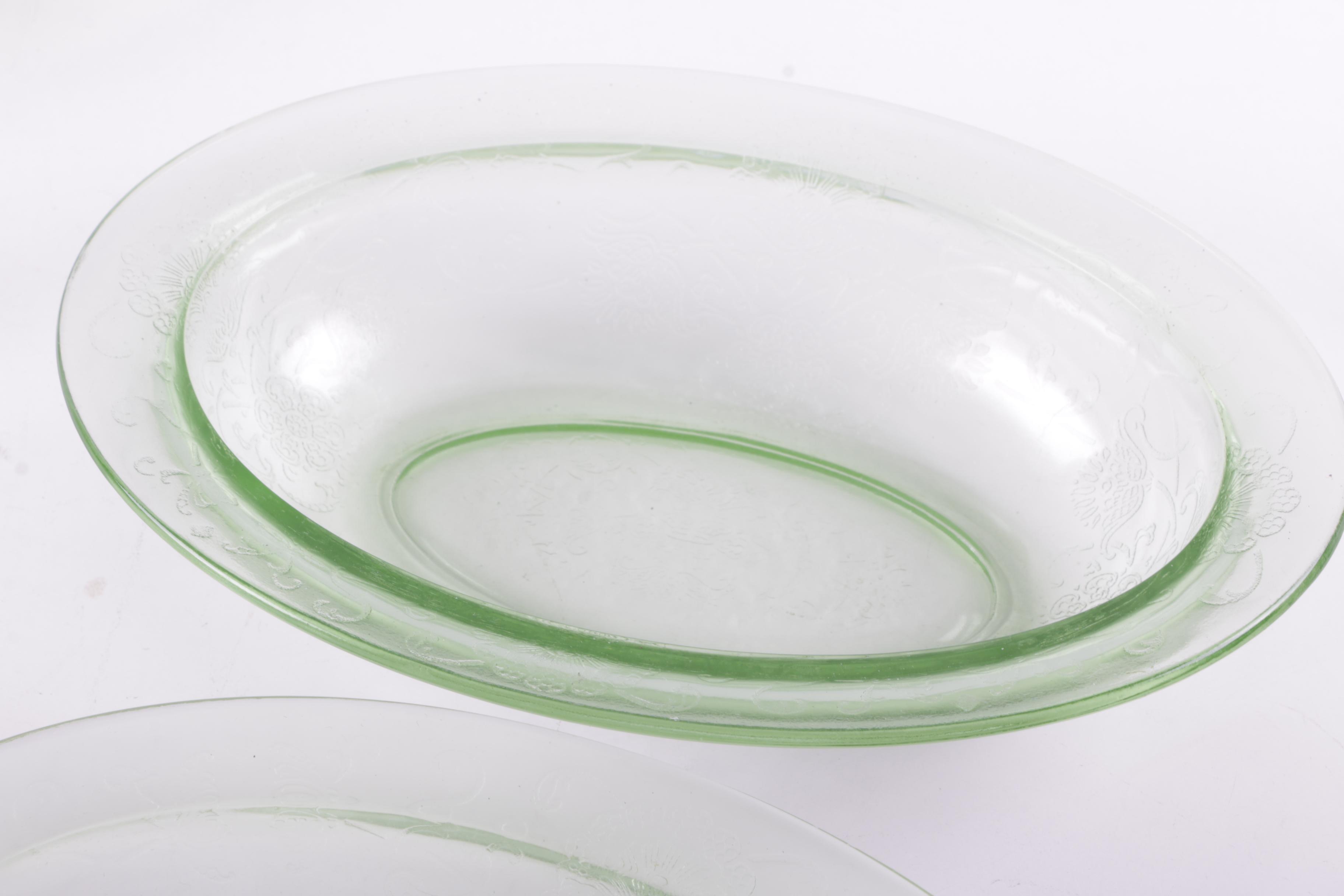A Collection of Eight Pieces of Vaseline Glass Dishes