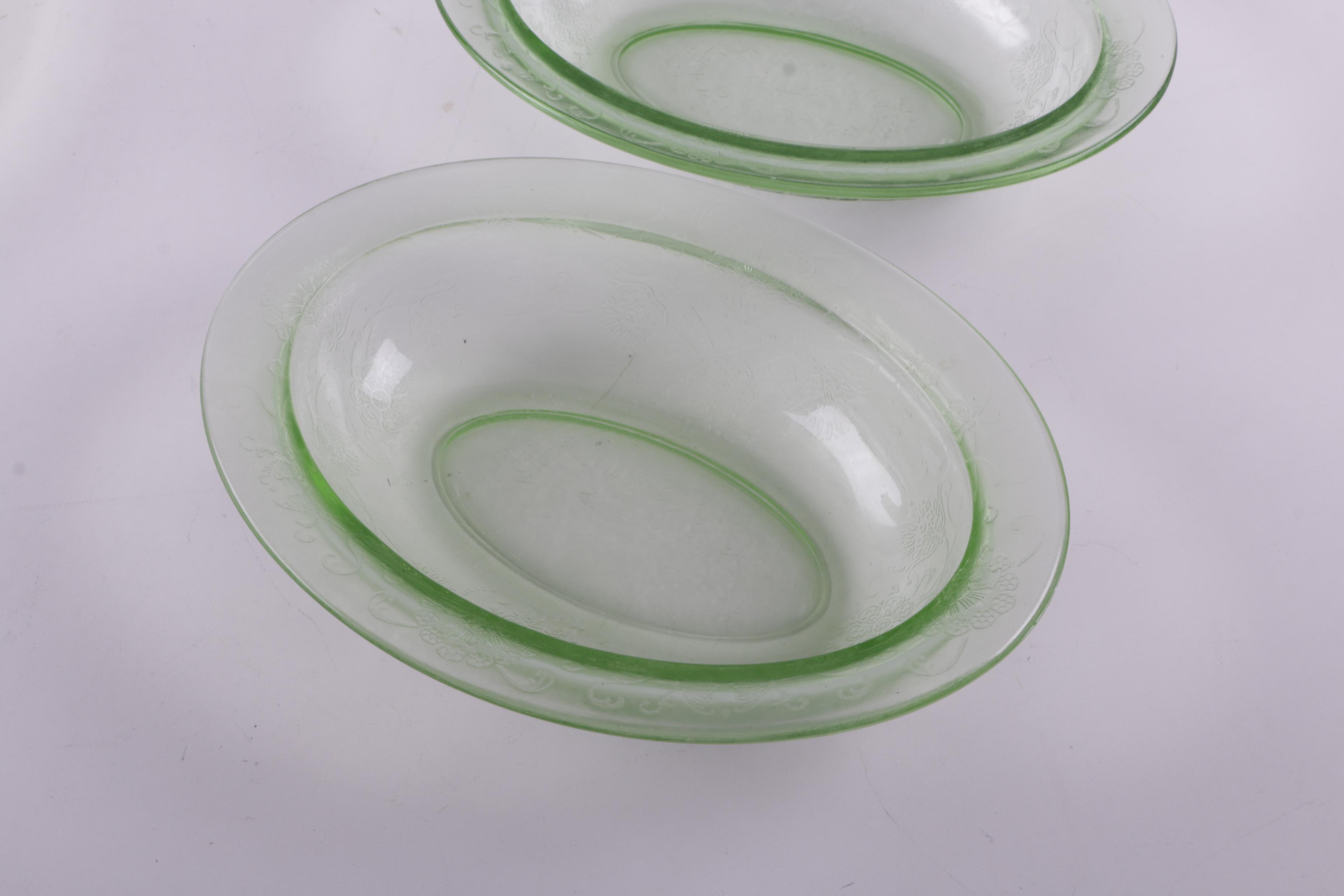 A Collection of Eight Pieces of Vaseline Glass Dishes
