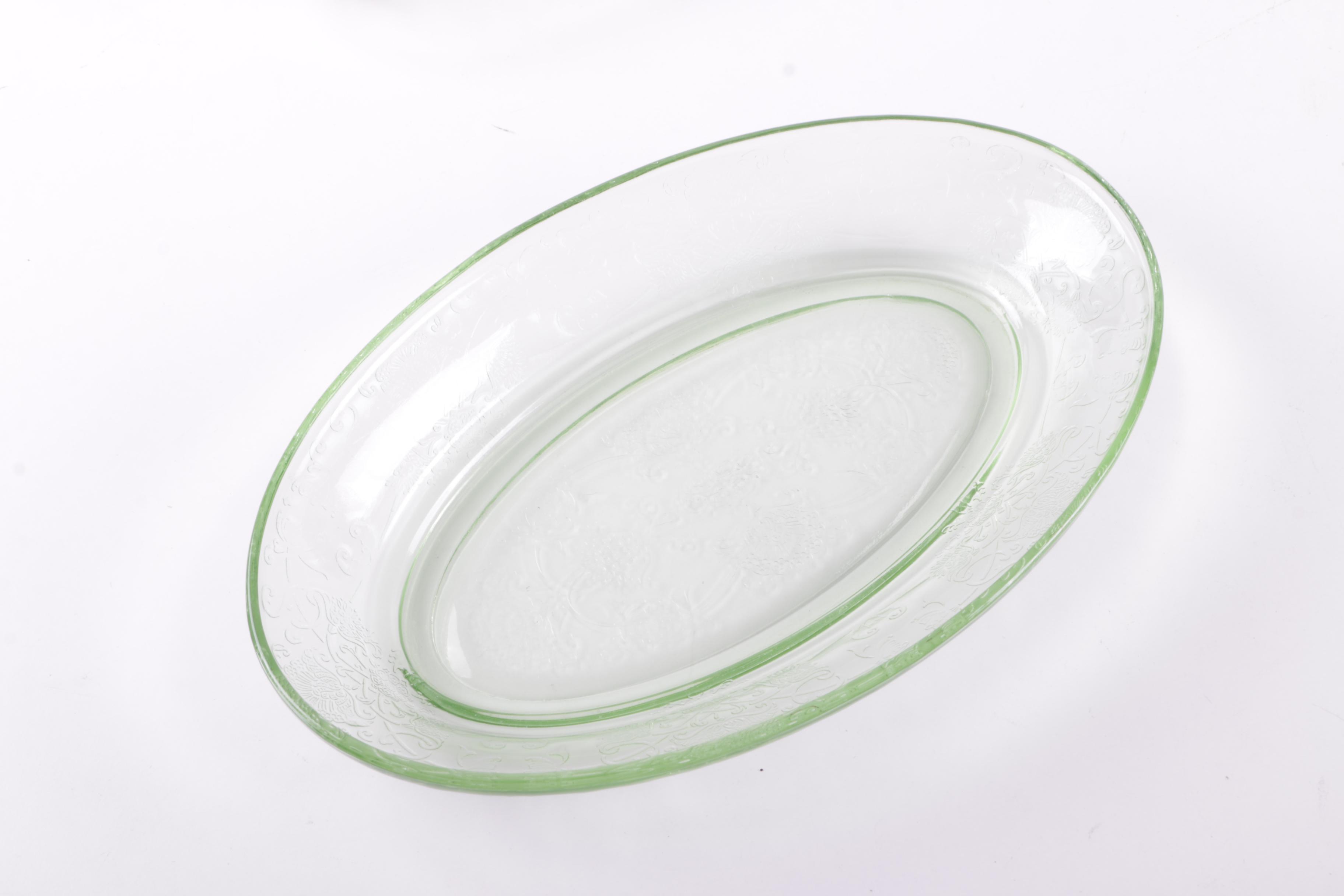 A Collection of Eight Pieces of Vaseline Glass Dishes