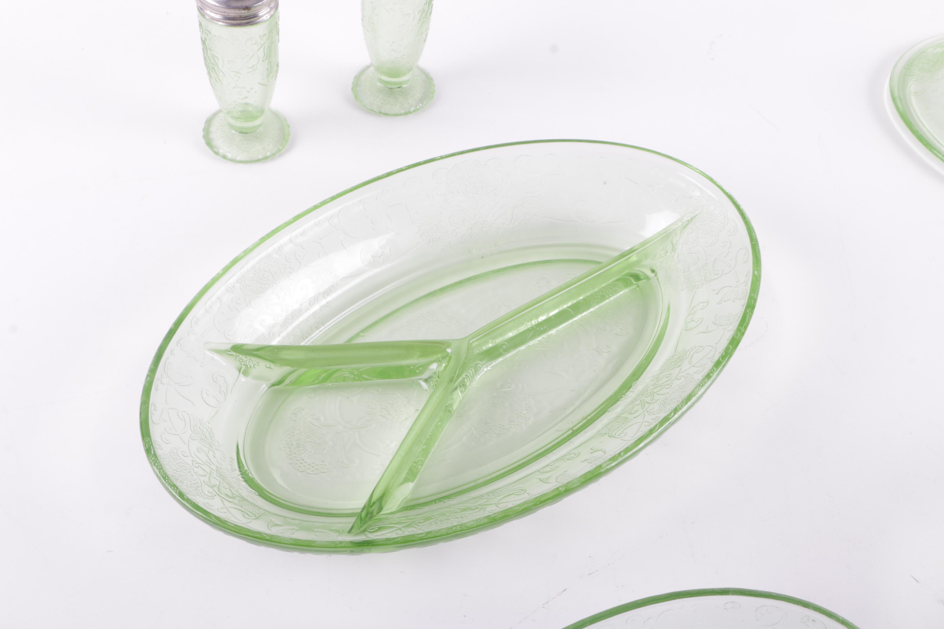 A Collection of Eight Pieces of Vaseline Glass Dishes