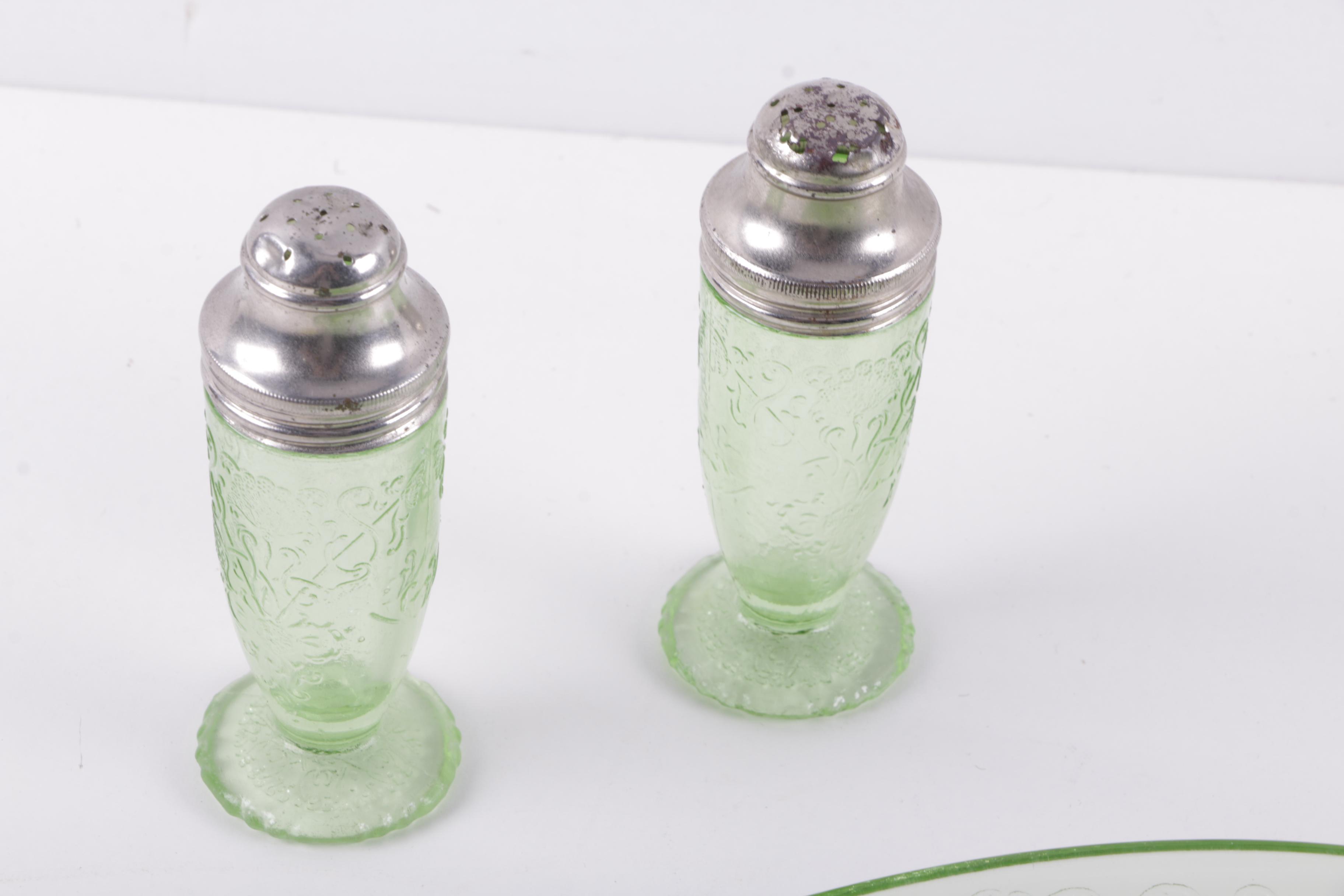 A Collection of Eight Pieces of Vaseline Glass Dishes