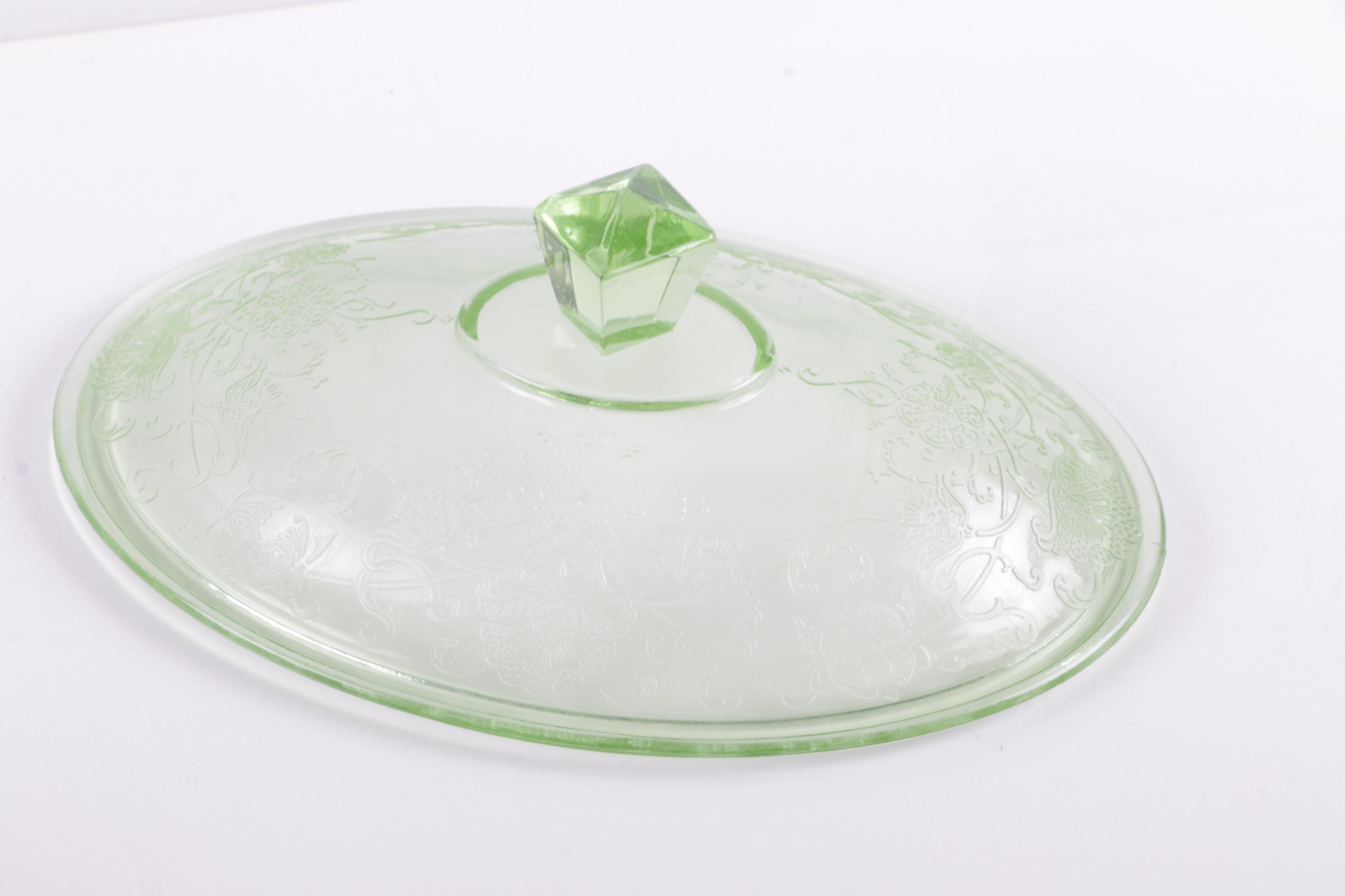 A Collection of Eight Pieces of Vaseline Glass Dishes