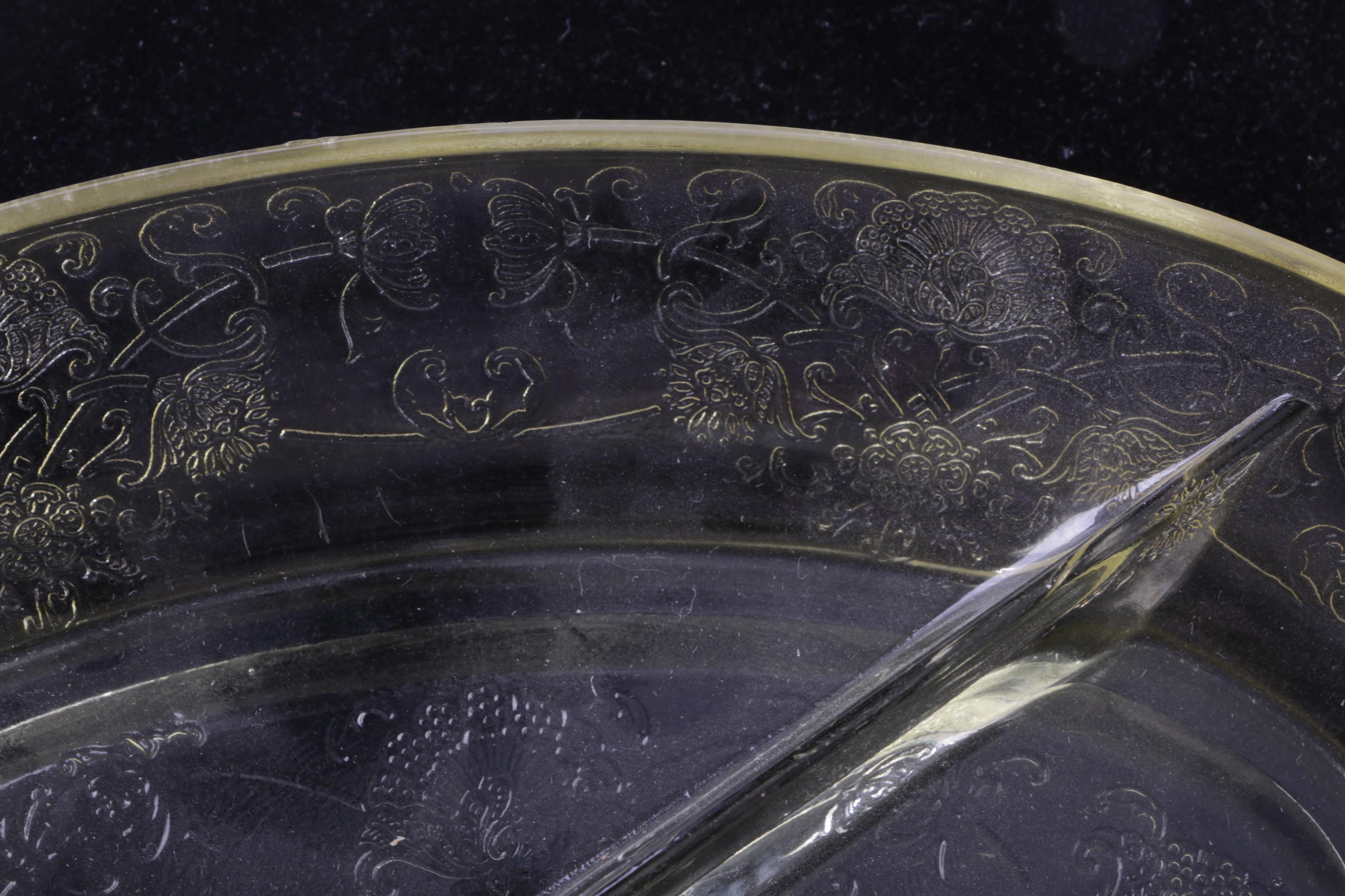 A Collection of Eight Pieces of Vaseline Glass Dishes