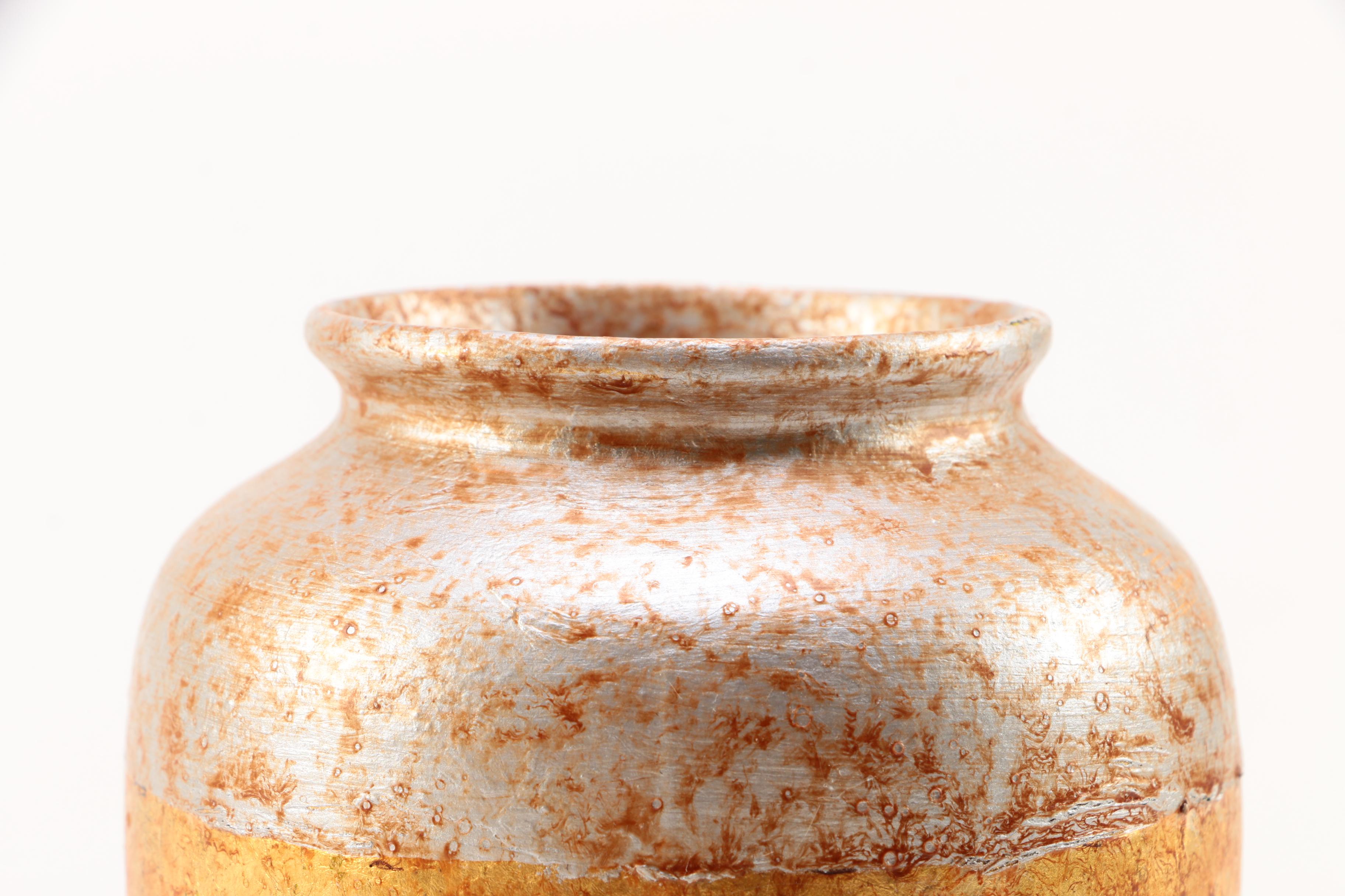 Pair of Gold and Silver Leaf Terra Cotta Vases