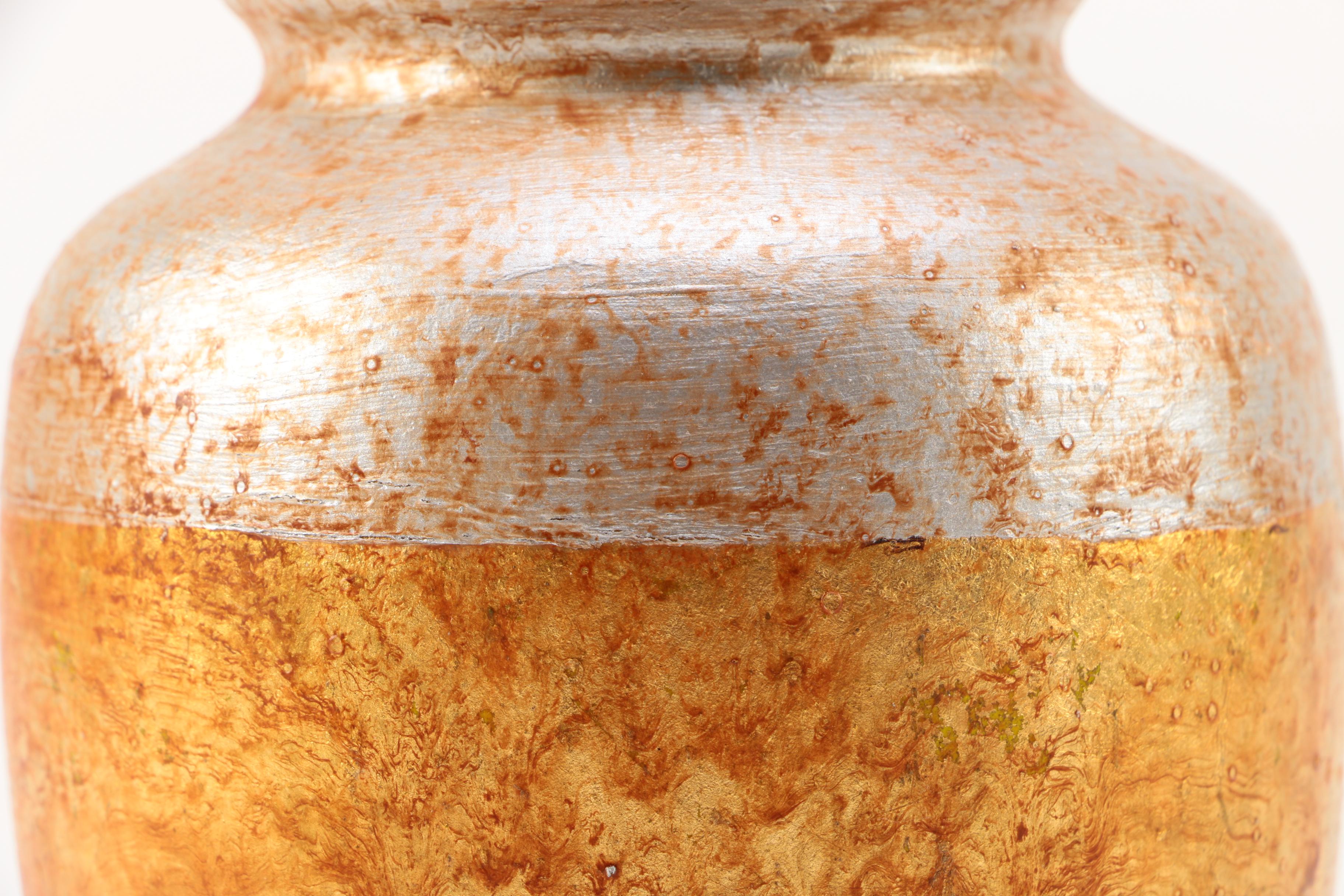 Pair of Gold and Silver Leaf Terra Cotta Vases