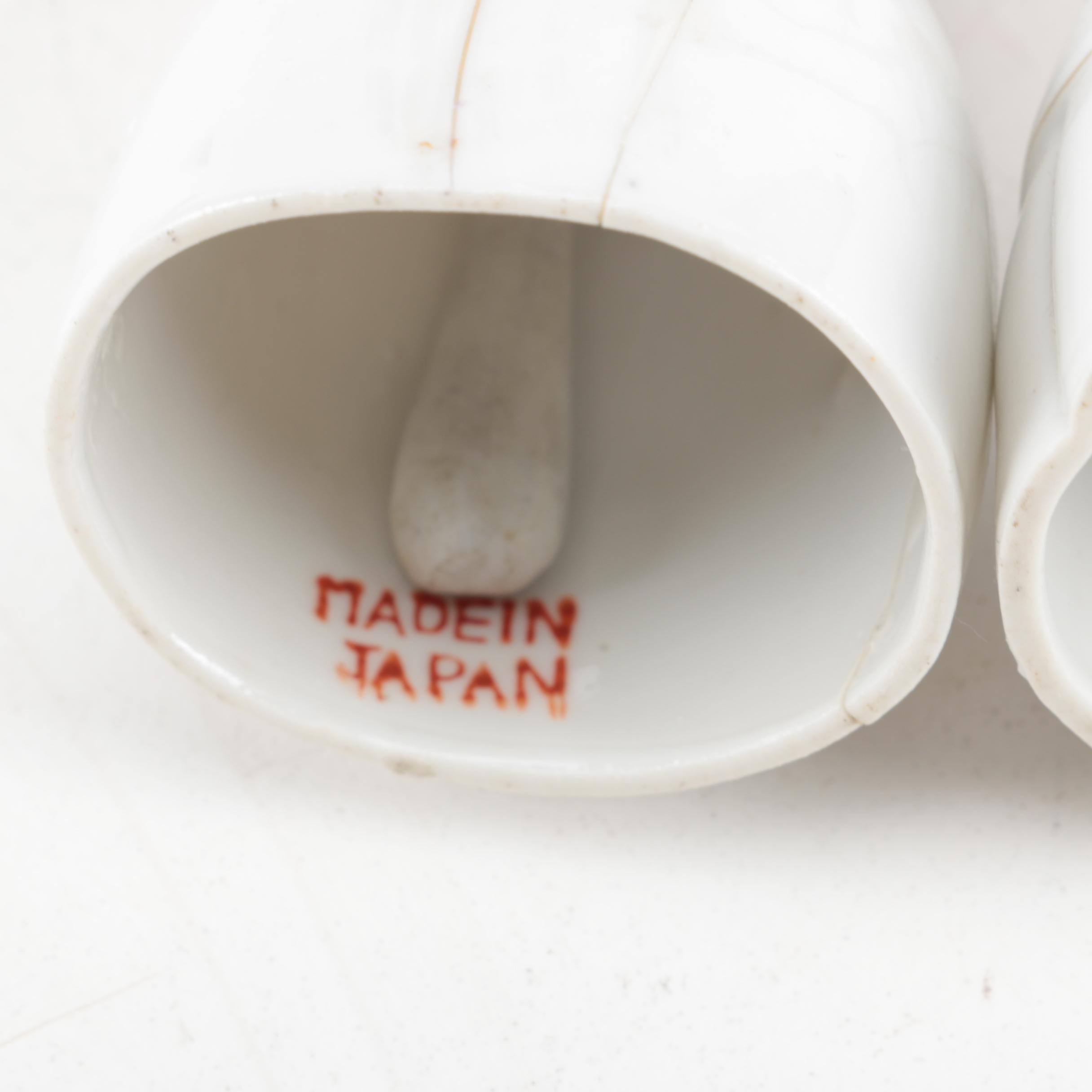 Vintage Man and Woman Shaped Ceramic Bells